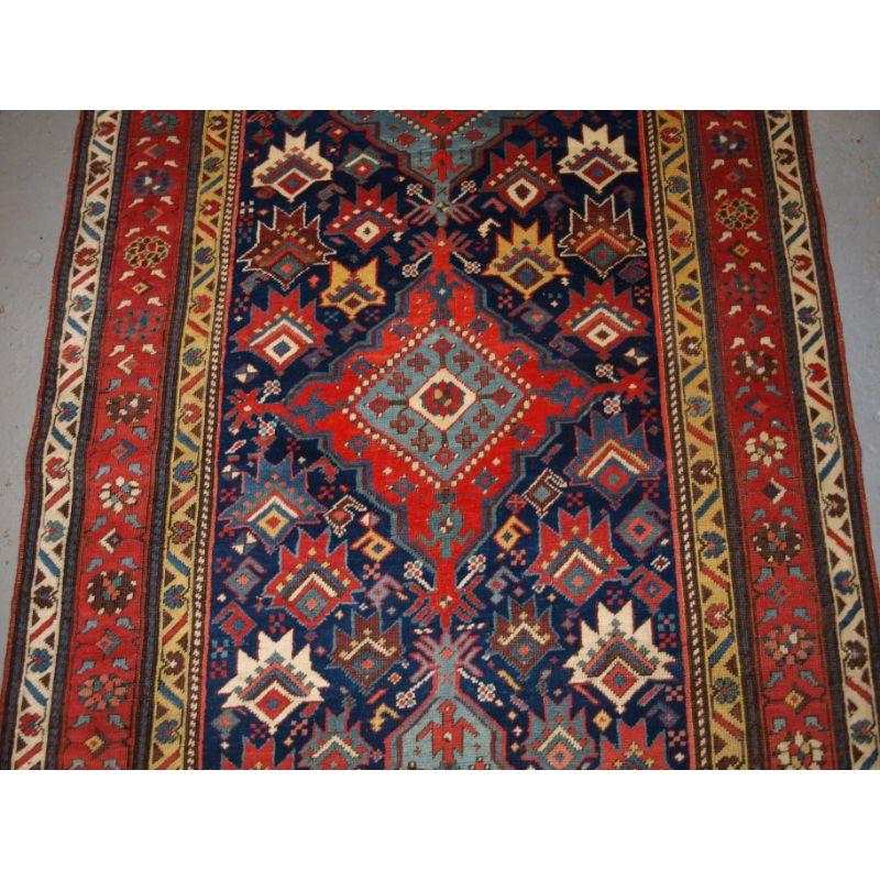Antique South Caucasian Runner with Repeat Medallion Design In Excellent Condition For Sale In Moreton-In-Marsh, GB