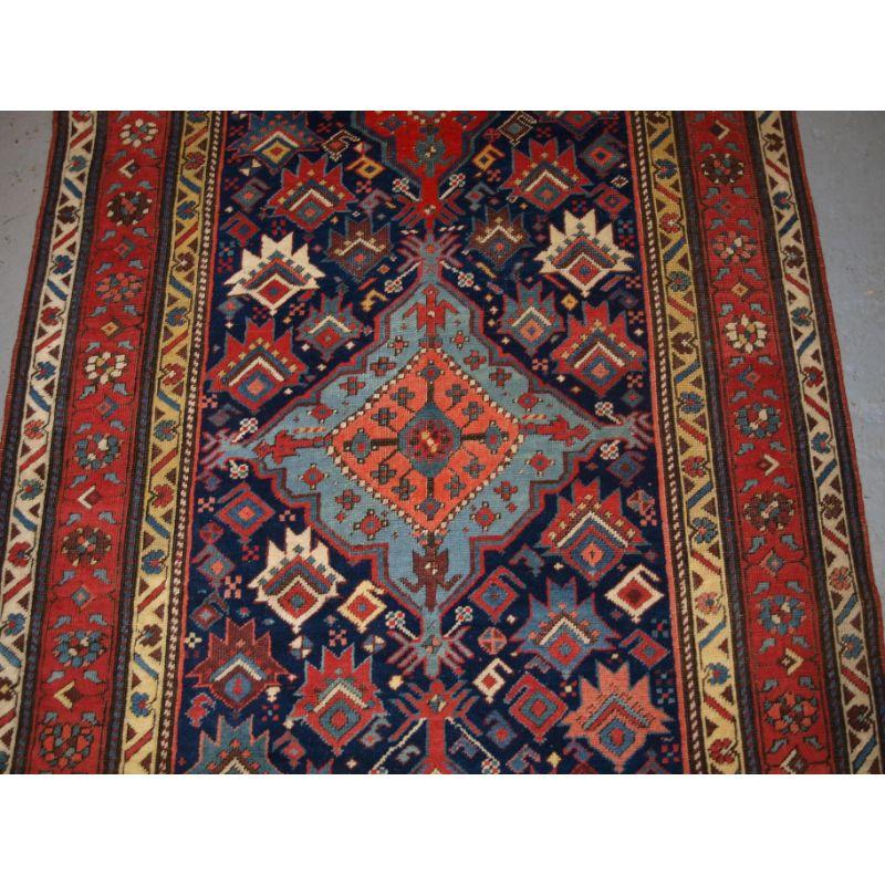 19th Century Antique South Caucasian Runner with Repeat Medallion Design For Sale