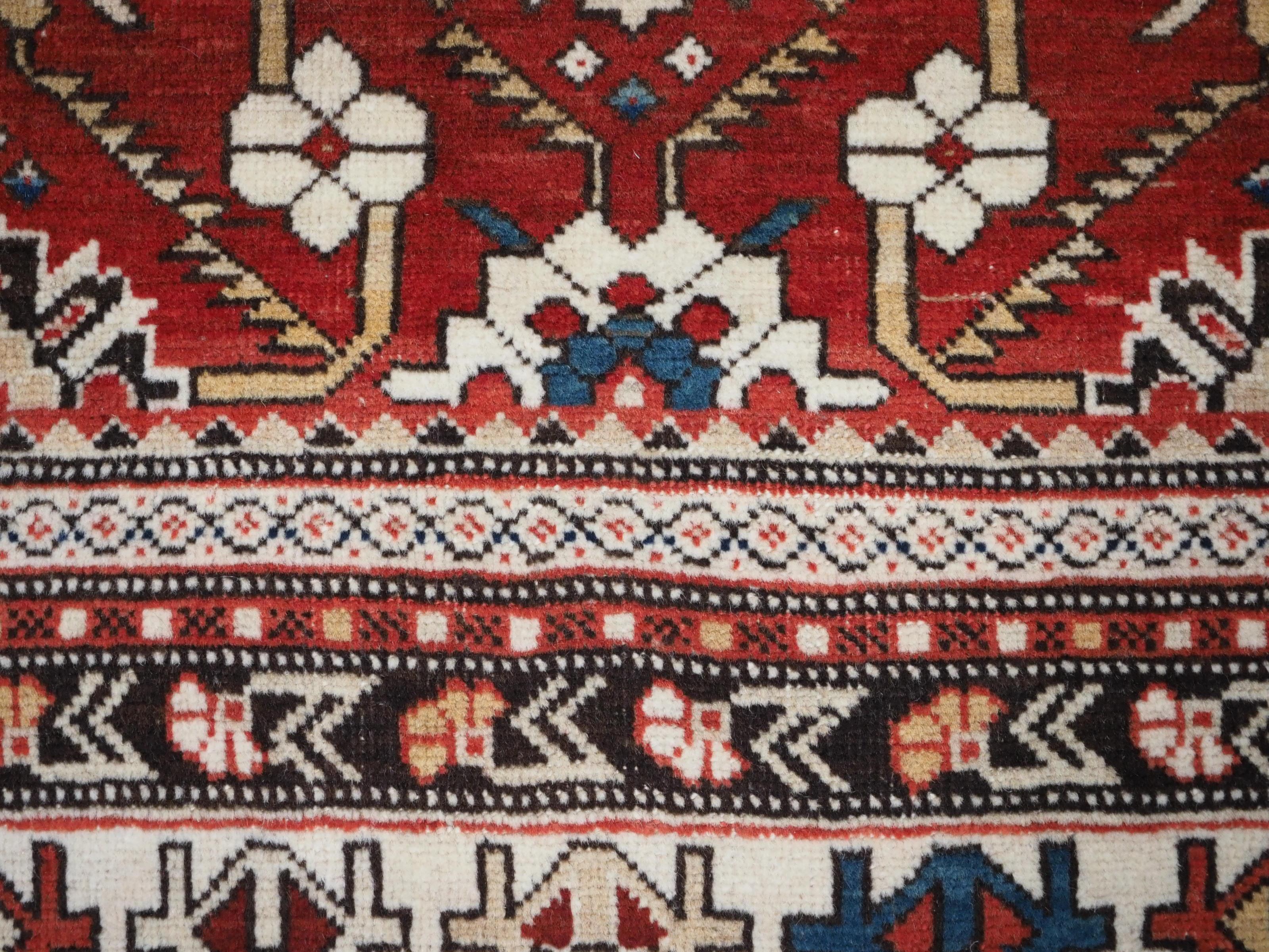Antique South East Caucasian Shirvan rug with bold floral lattice design. For Sale 7