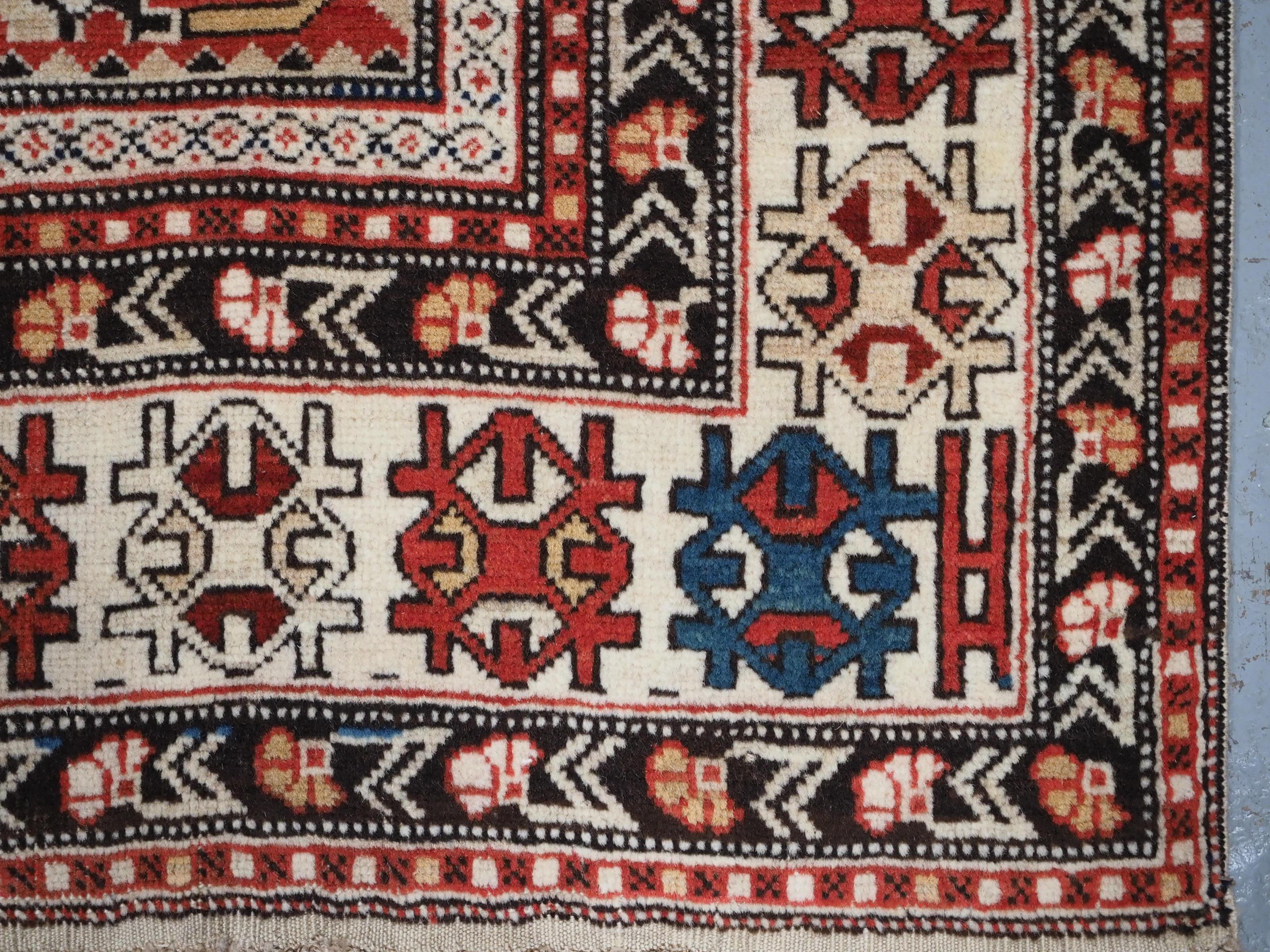 Antique South East Caucasian Shirvan rug with bold floral lattice design. For Sale 8