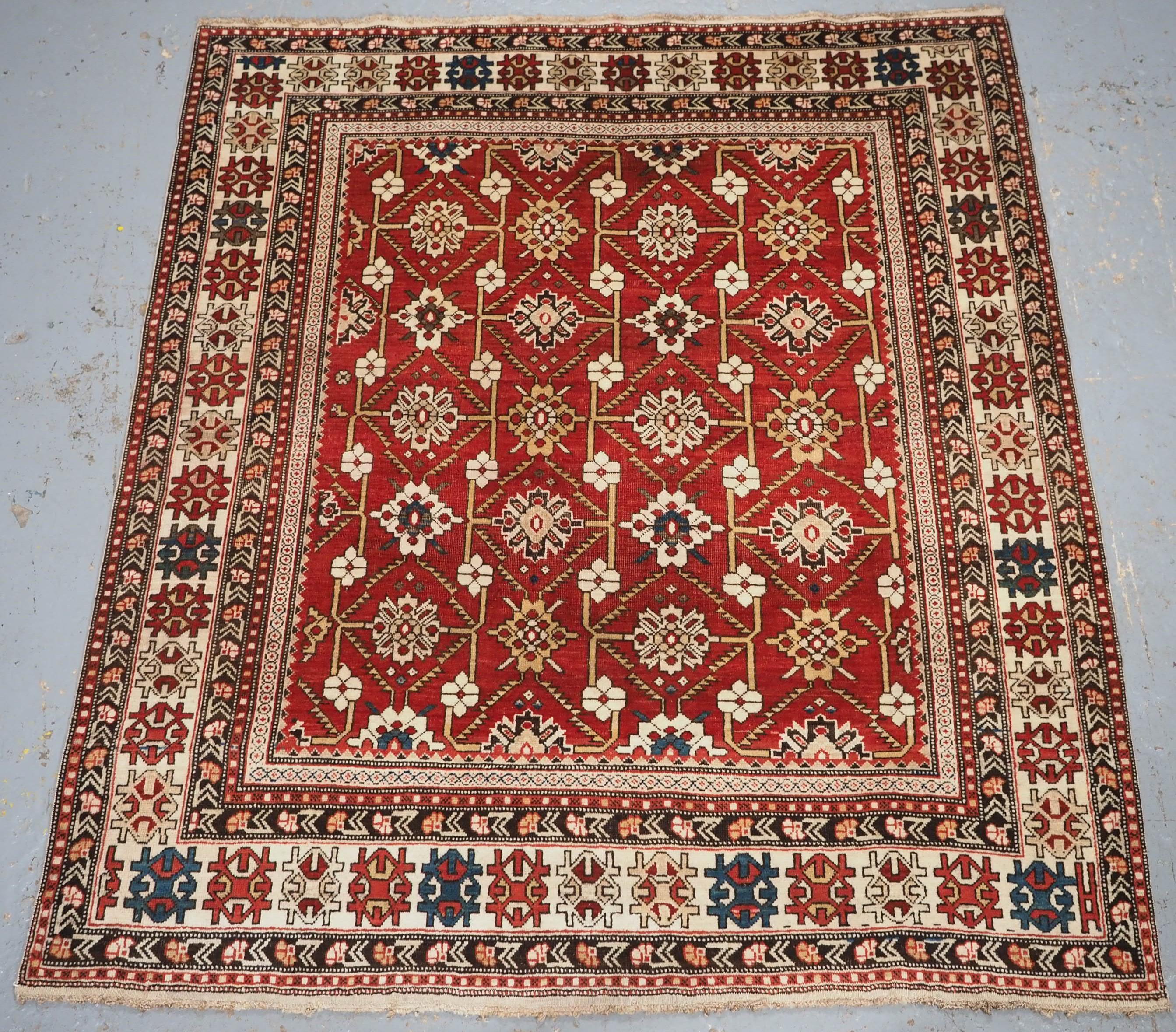 Antique South East Caucasian Shirvan rug with bold floral lattice design. For Sale 10