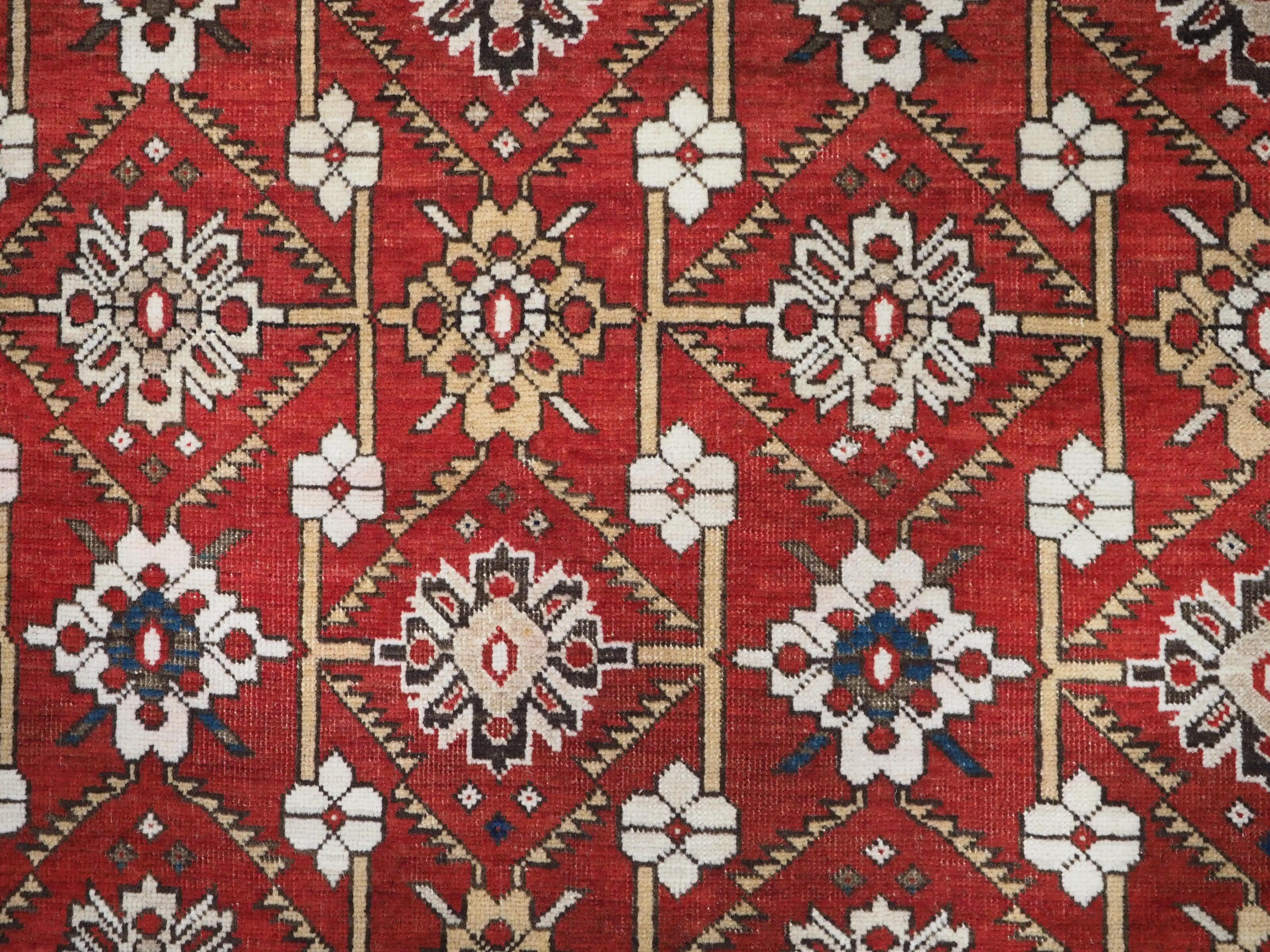 Antique South East Caucasian Shirvan rug with bold floral lattice design. For Sale 3