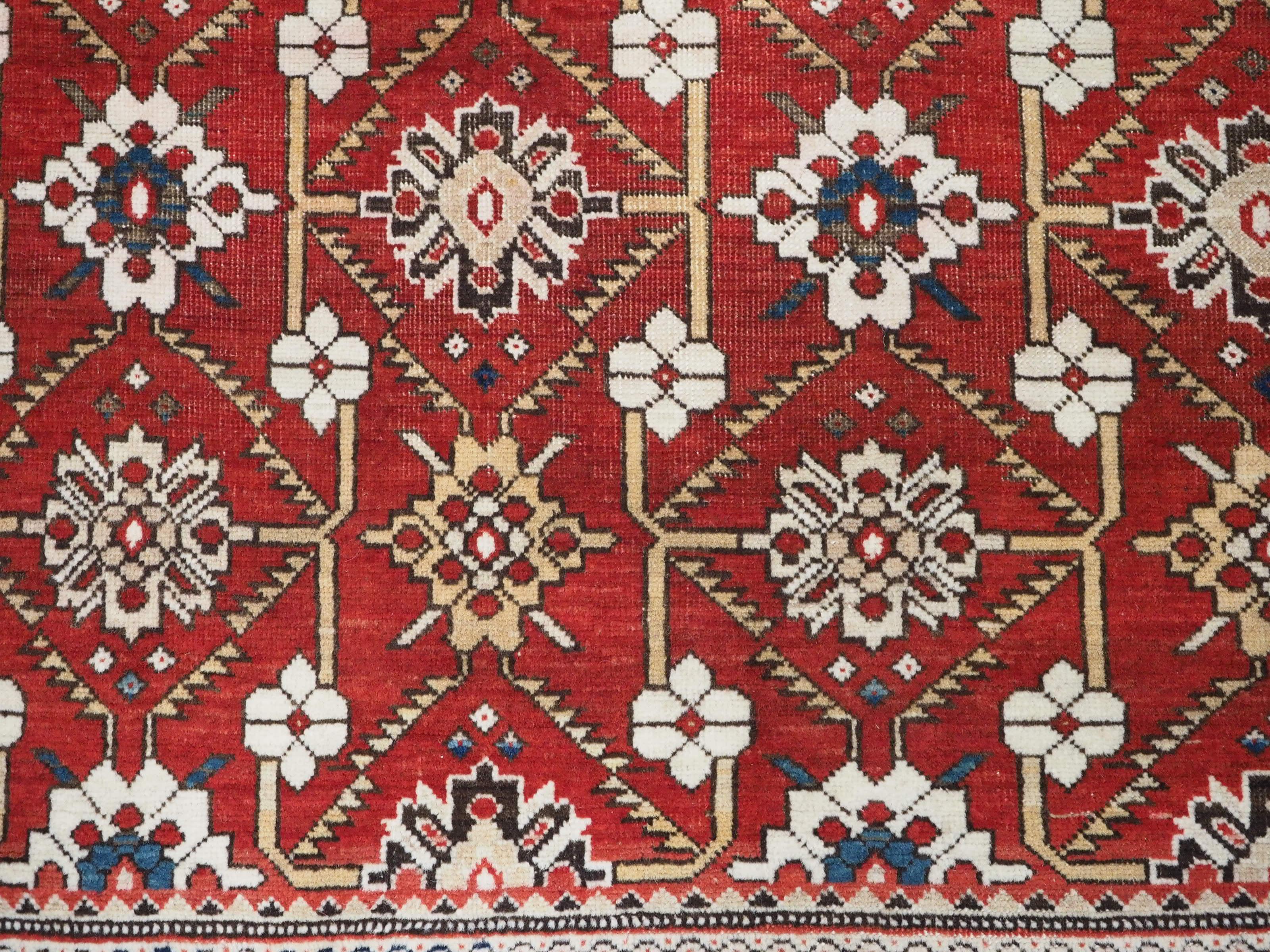 Antique South East Caucasian Shirvan rug with bold floral lattice design. For Sale 4