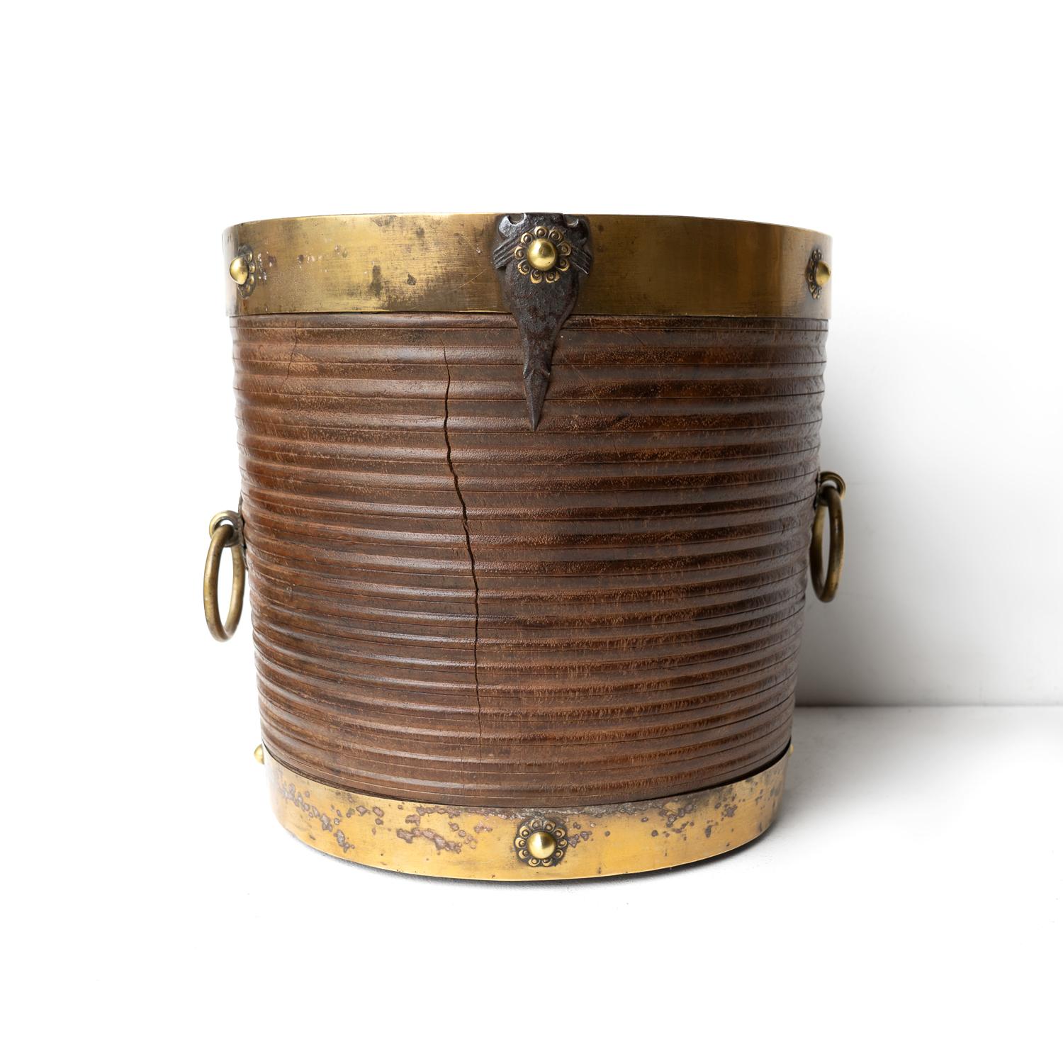 ANTIQUE ANGLO-INDIAN BUCKET STORAGE CONTAINER 

Originally used for measuring grain, usually rice and known locally as a ‘Padi’ or ‘Pari’. Could be used for any number of modern purposes and a highly decorative object in its own right. 

Originating