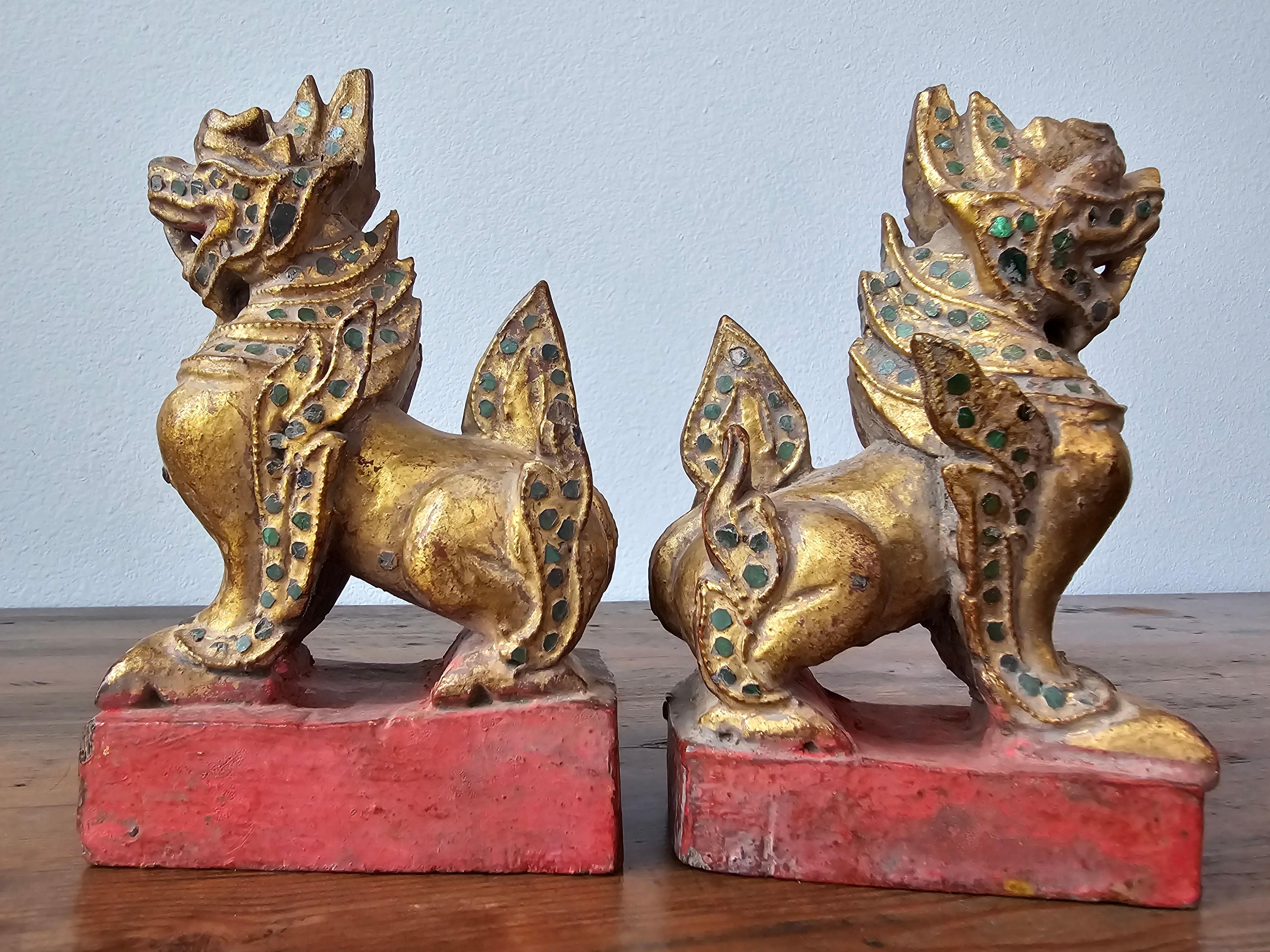 Hand-Carved Antique Southeast Asian Burmese Jeweled Carved Qilin Foo Lion Figure Statue Pair For Sale