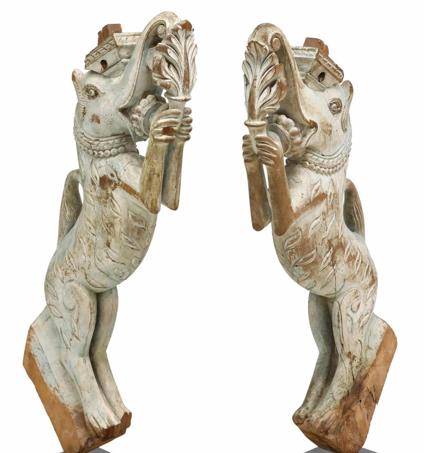 A rare and most interesting pair of two antique Southeast Asian Temple pillar struts / architectural elements. 

The hand carved and painted wood figural decorative building elements depicting mythical creature, possibly Yali, resembling an elephant