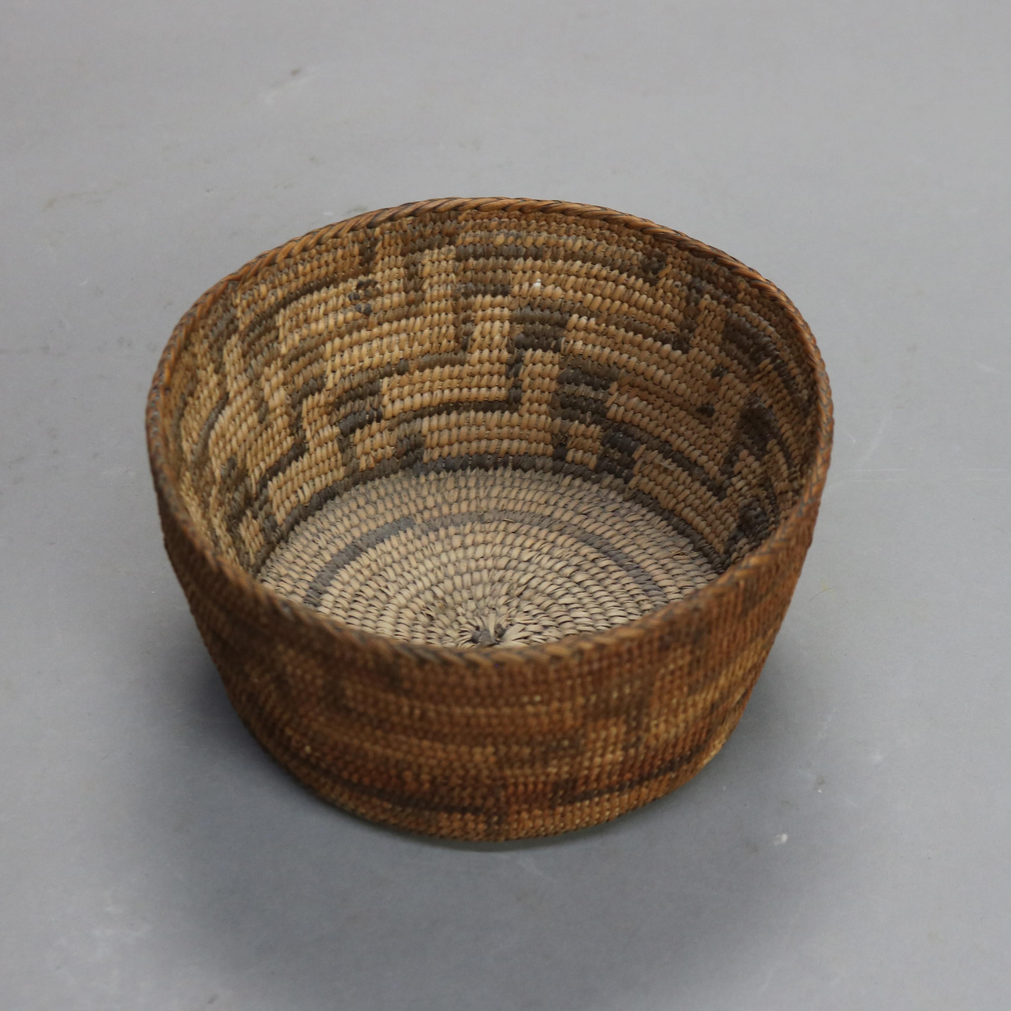 Antico cesto di canne intrecciate del sud-ovest nativo americano Navajo C1900

Misure: 7,5