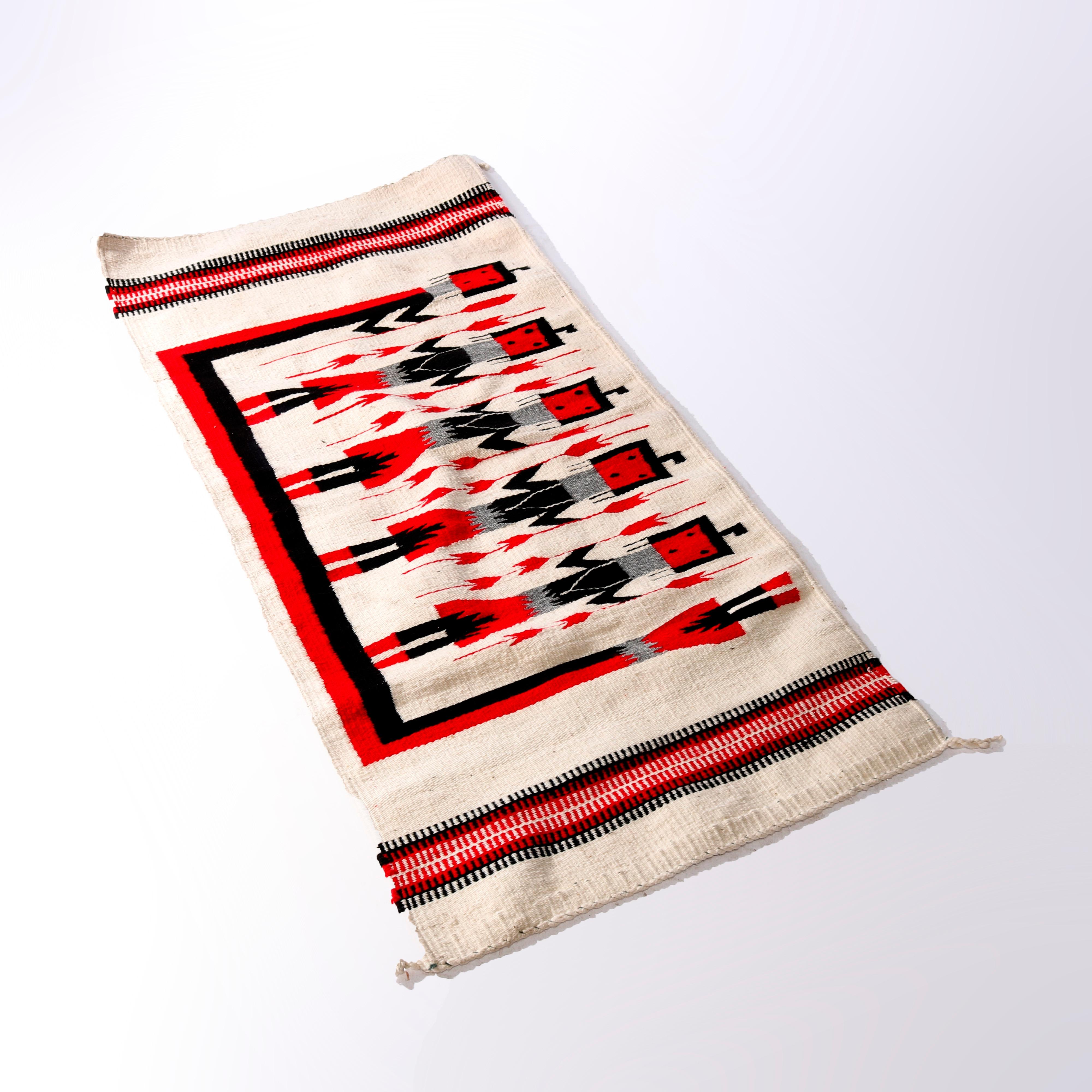 An antique Southwestern Native American Indian Navajo Yei rug offers wool construction with five men in red and black on white ground, c1930

Measures - 29''H x 60''W x .5''D.