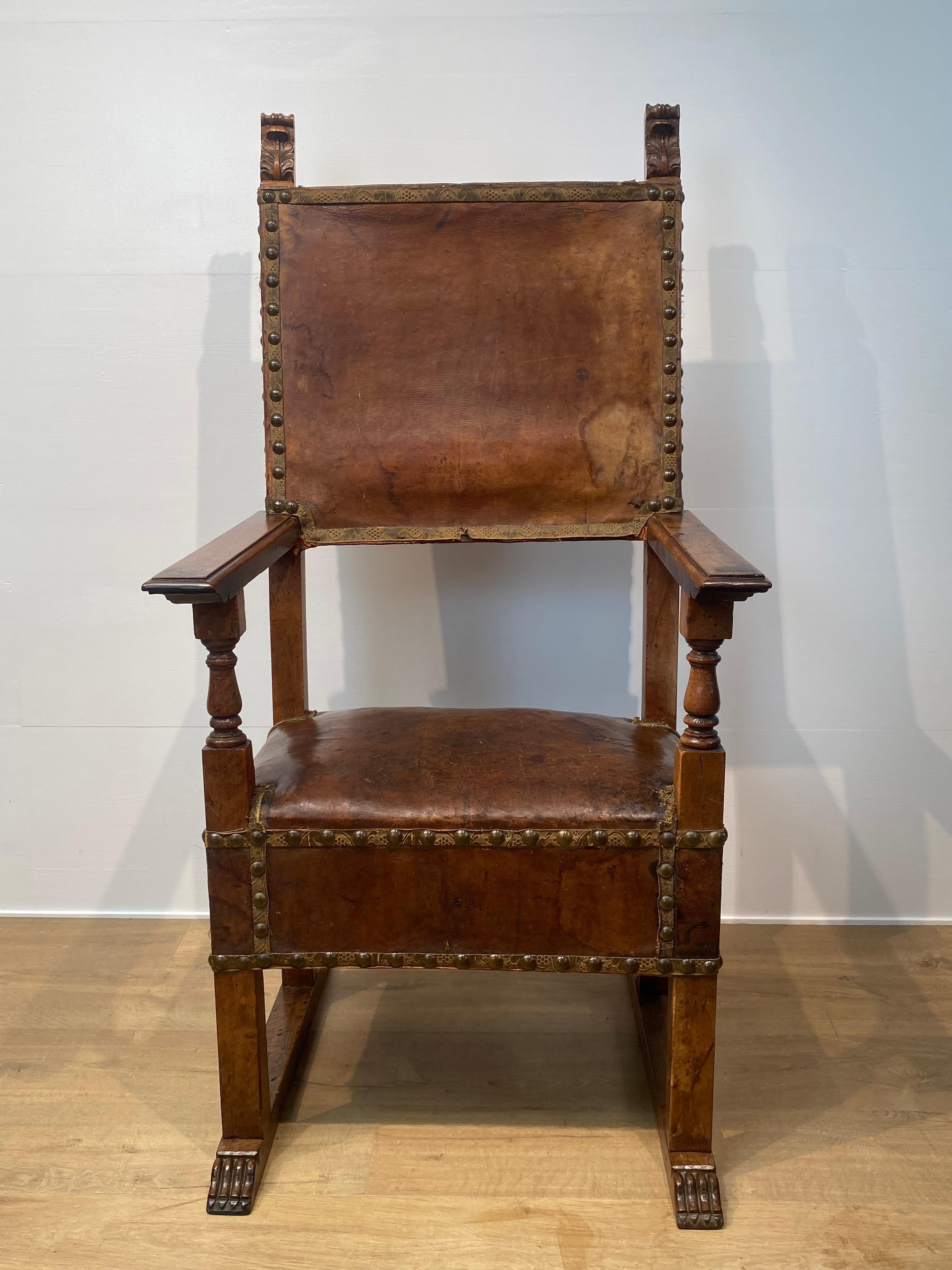 Patinated Antique Spanish Armchair in Leather For Sale