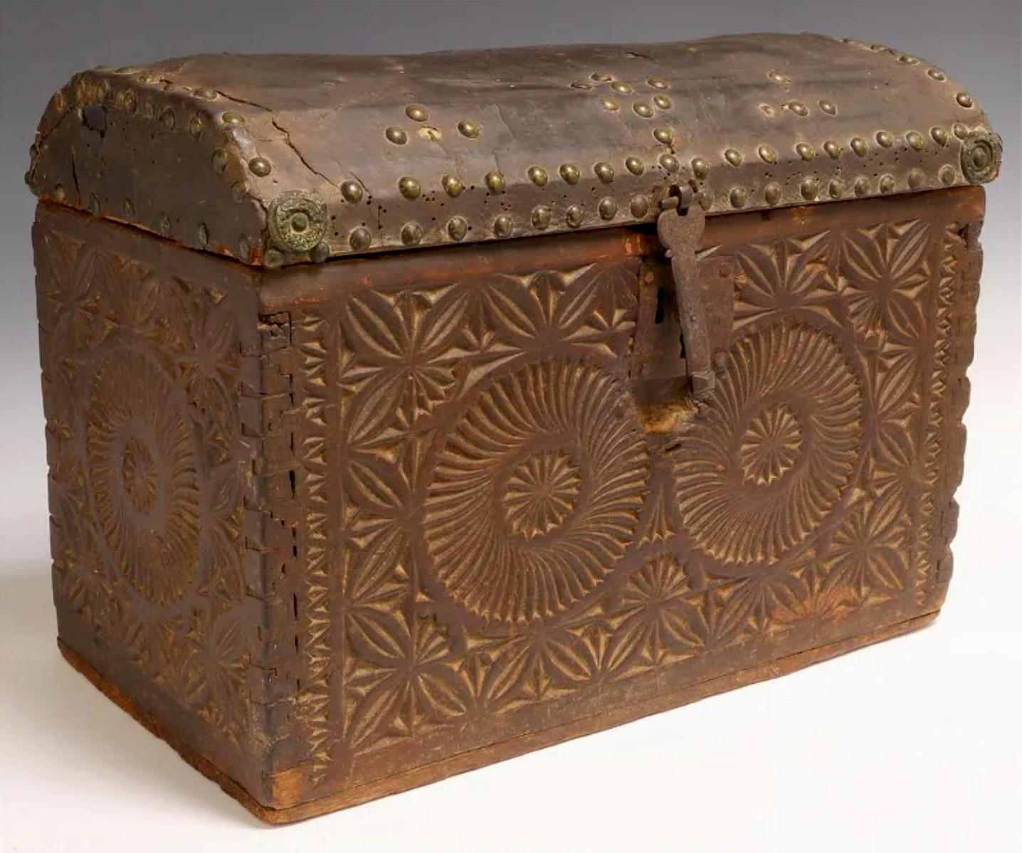 A scarce 300-year-old Spanish Colonial period leather clad and carved travel chest with beautifully aged patina. circa 1725

Born in the first half of the 18th century, this small scale chest would have been used by a Spanish colonist / settler