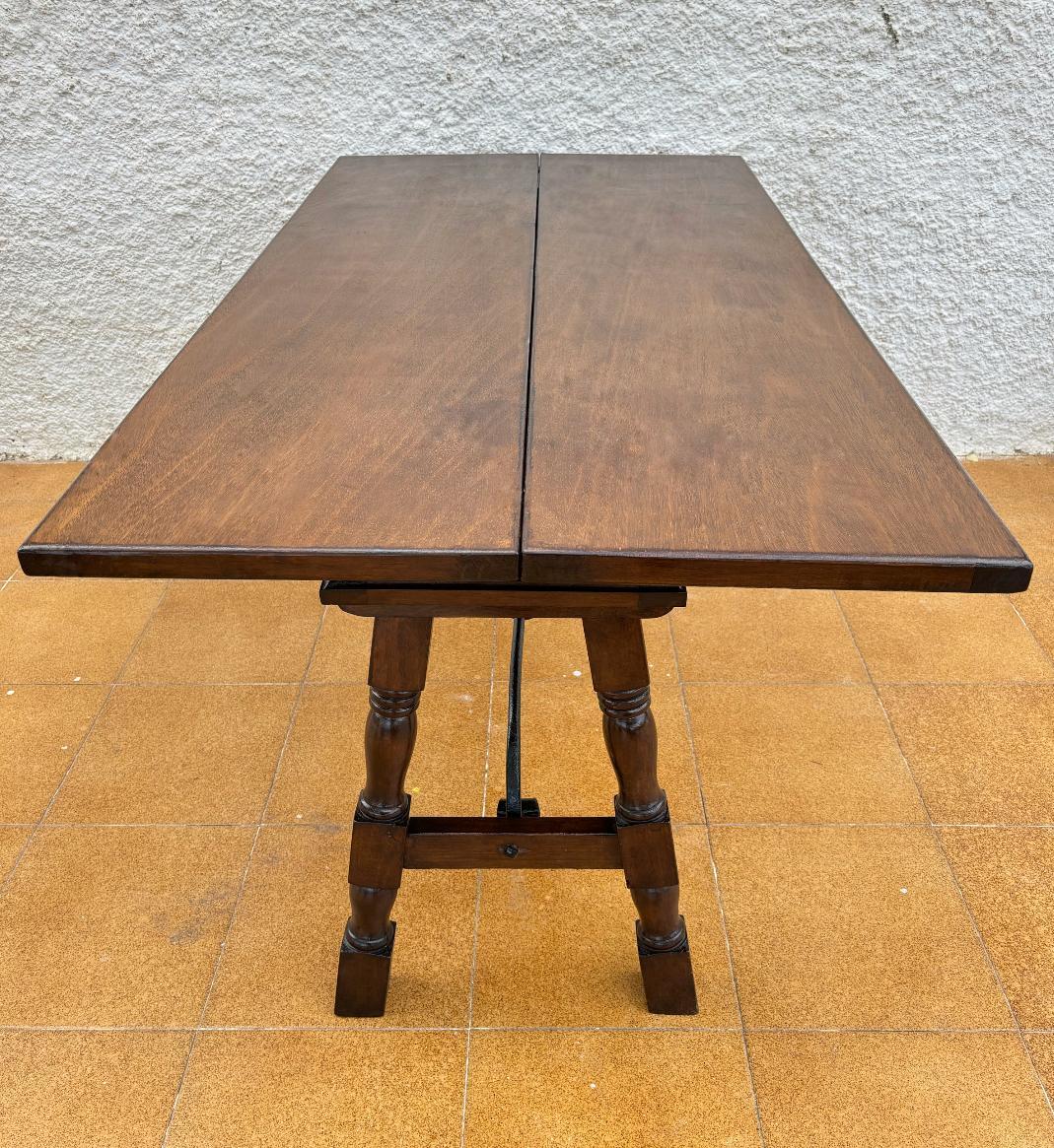 Antique Spanish Console Fold Out Table with Iron Stretcher and Three Drawers In Good Condition For Sale In Miami, FL