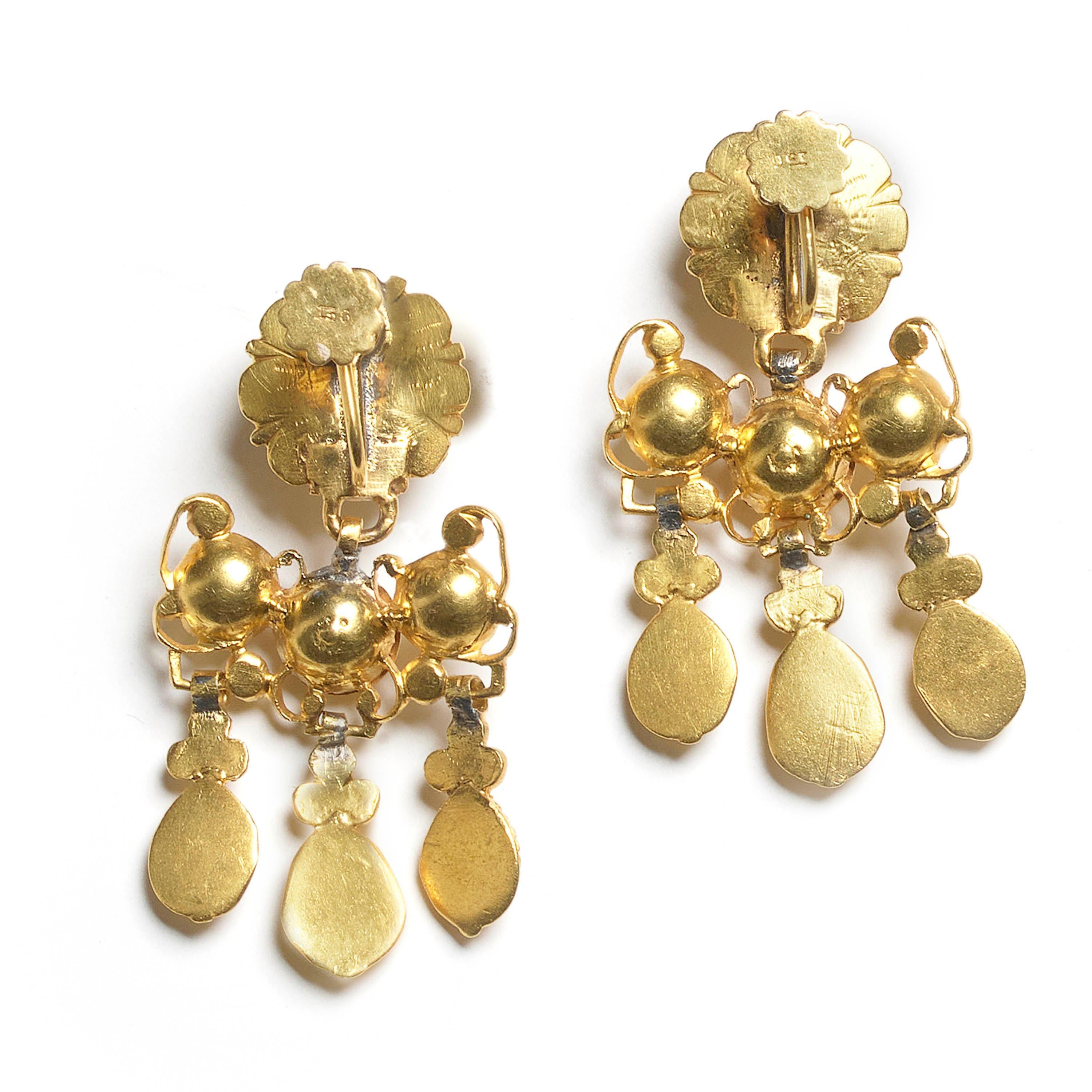 A pair of 18th century Spanish diamond and gold girandole drop earrings, with rosette tops, with domed centres, with engraved edges, set with a rose-cut diamond in the middle, the dome has a surrounding cluster of  rose-cut diamonds, in smaller,