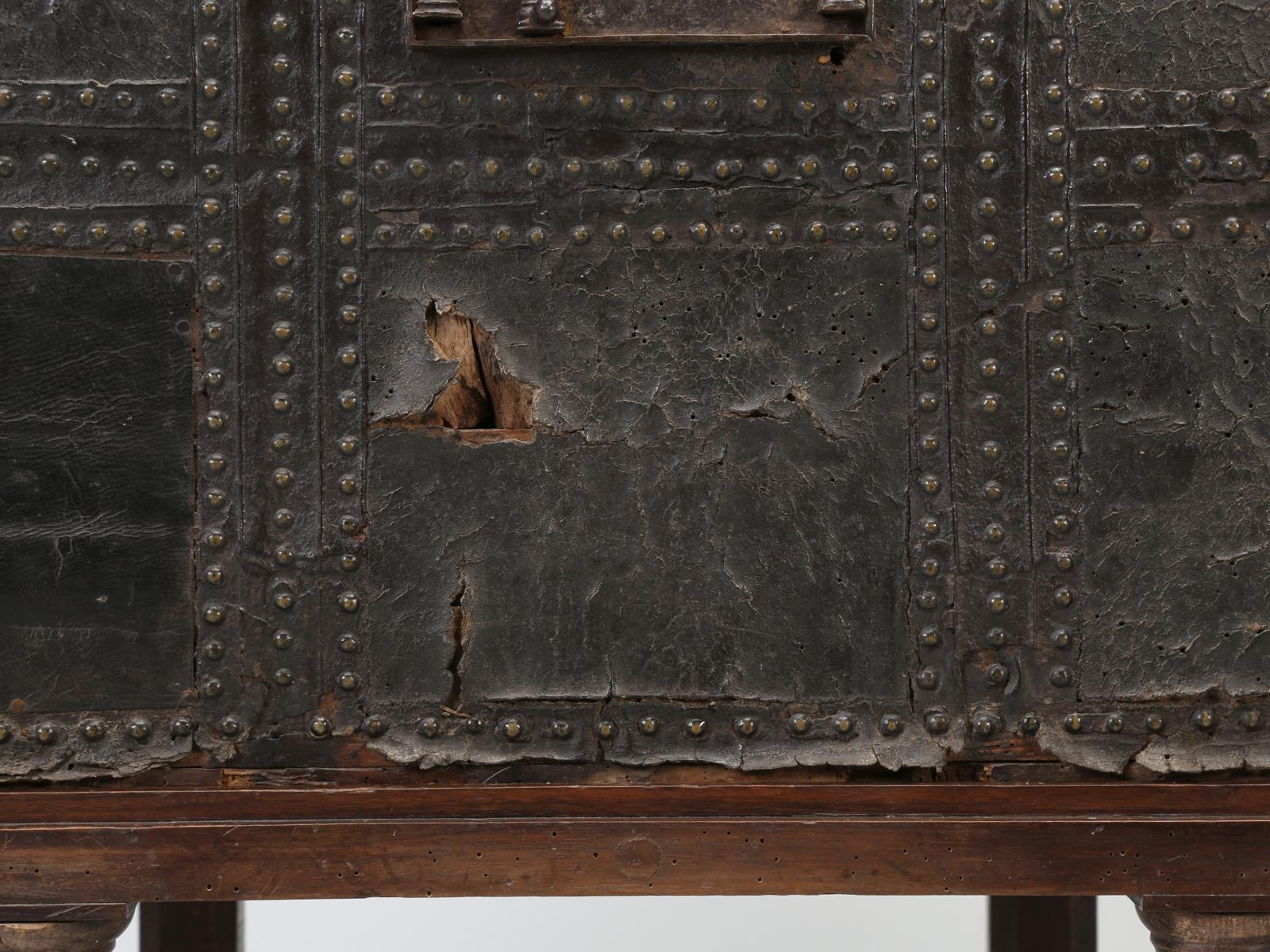 Country Antique Spanish Leather Trunk and a Barley Twist Stand, circa 1600s