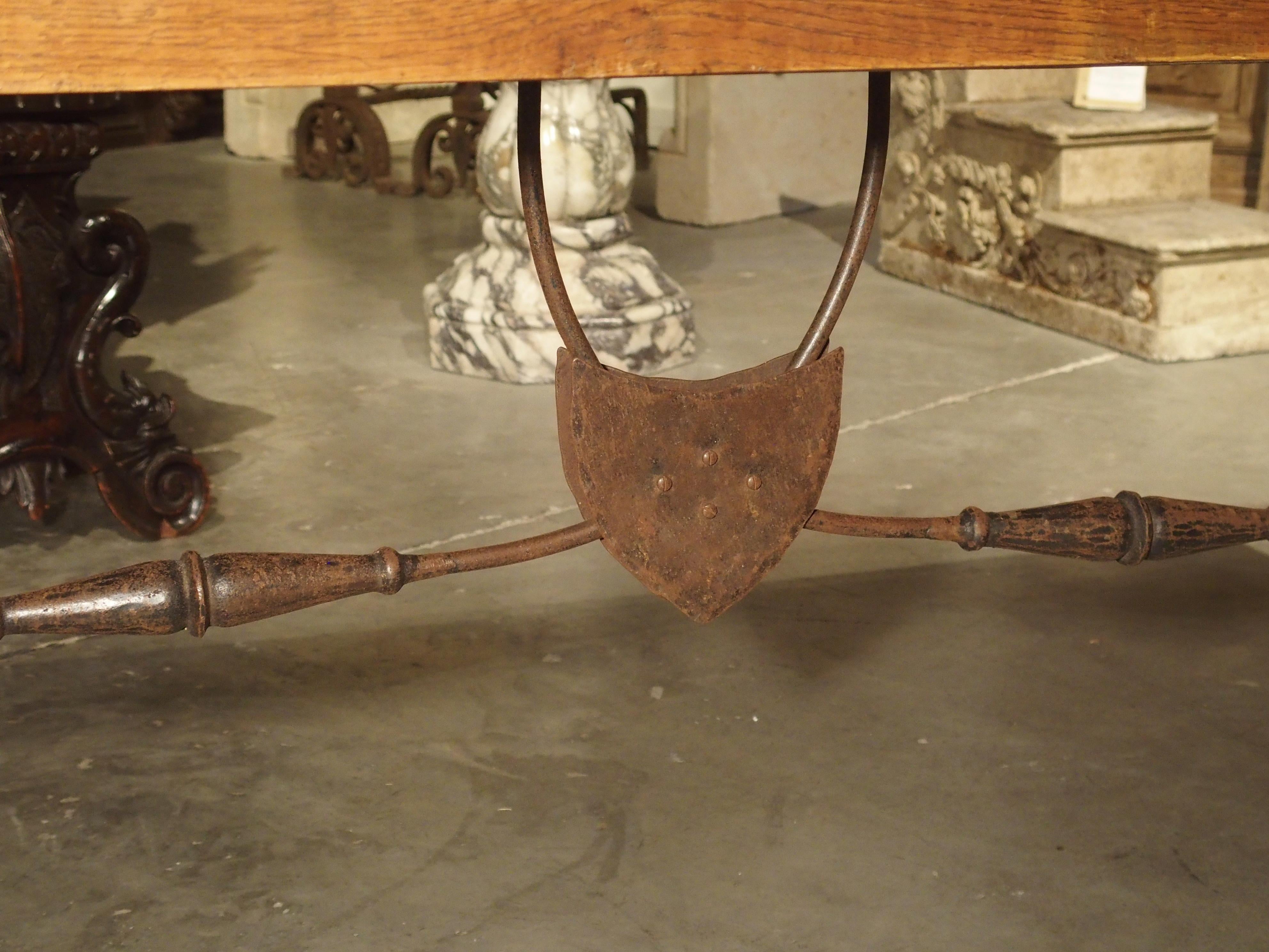 Early 20th Century Antique Spanish Oak Table with Wrought Iron Stretcher