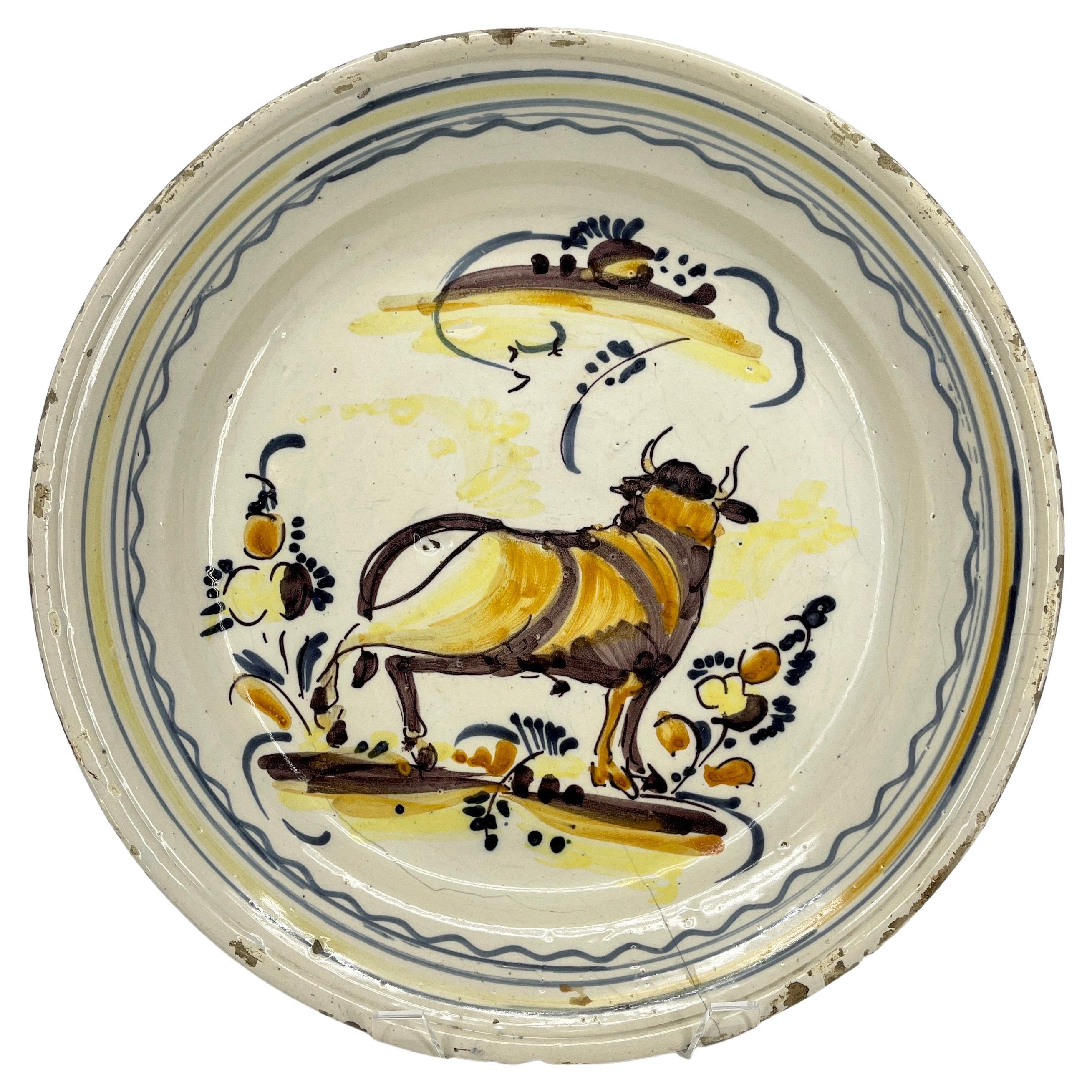 Antique Spanish Polychrome Ceramic Charger with a Bull Decoration For Sale