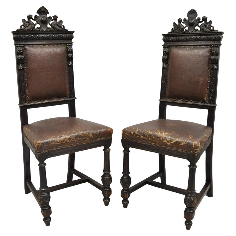 Antique Spanish Renaissance Carved Oak Wood Figural Leather Side Chairs - a Pair