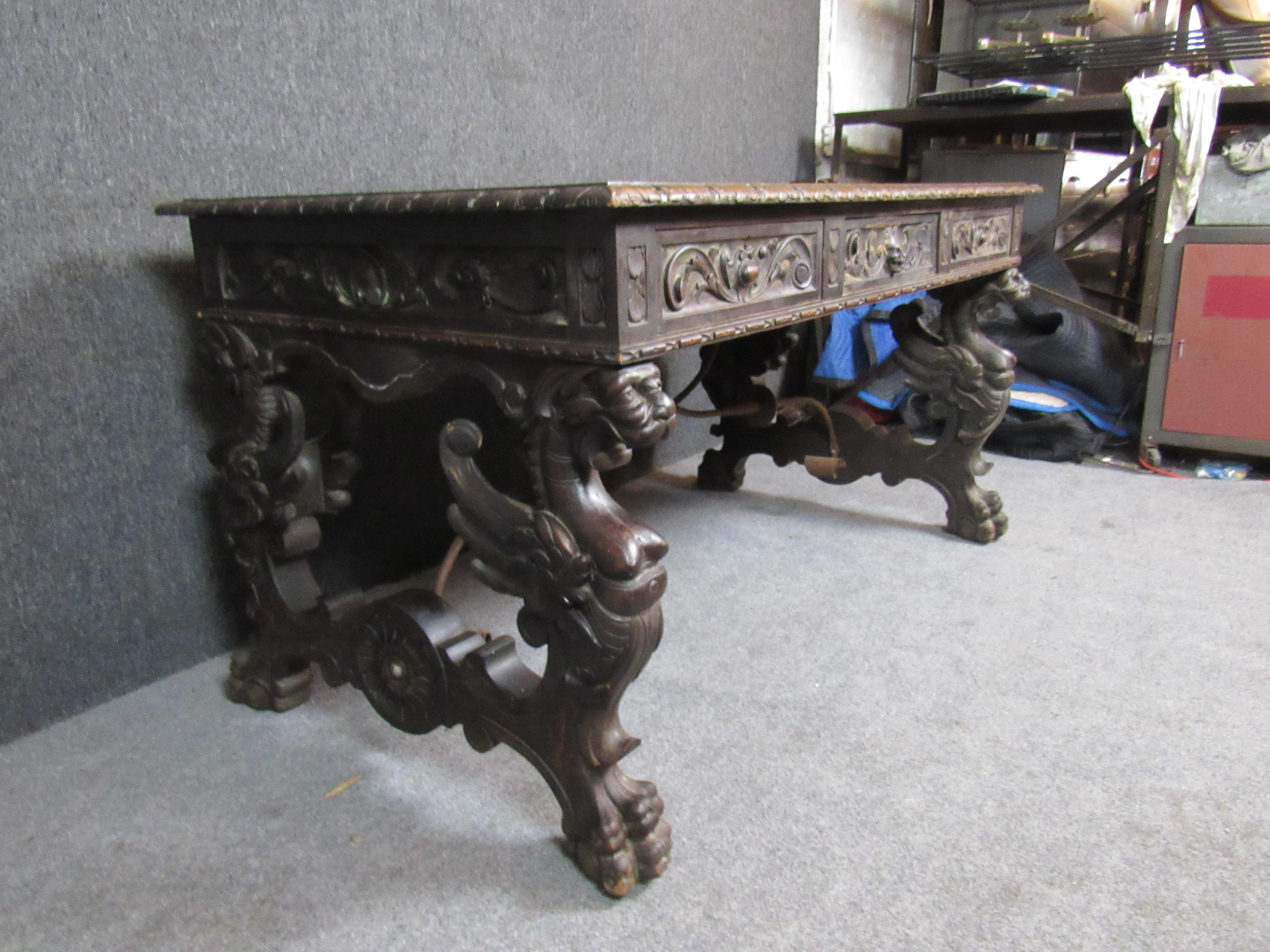Carved Antique Spanish Renaissance Claw Foot Desk
