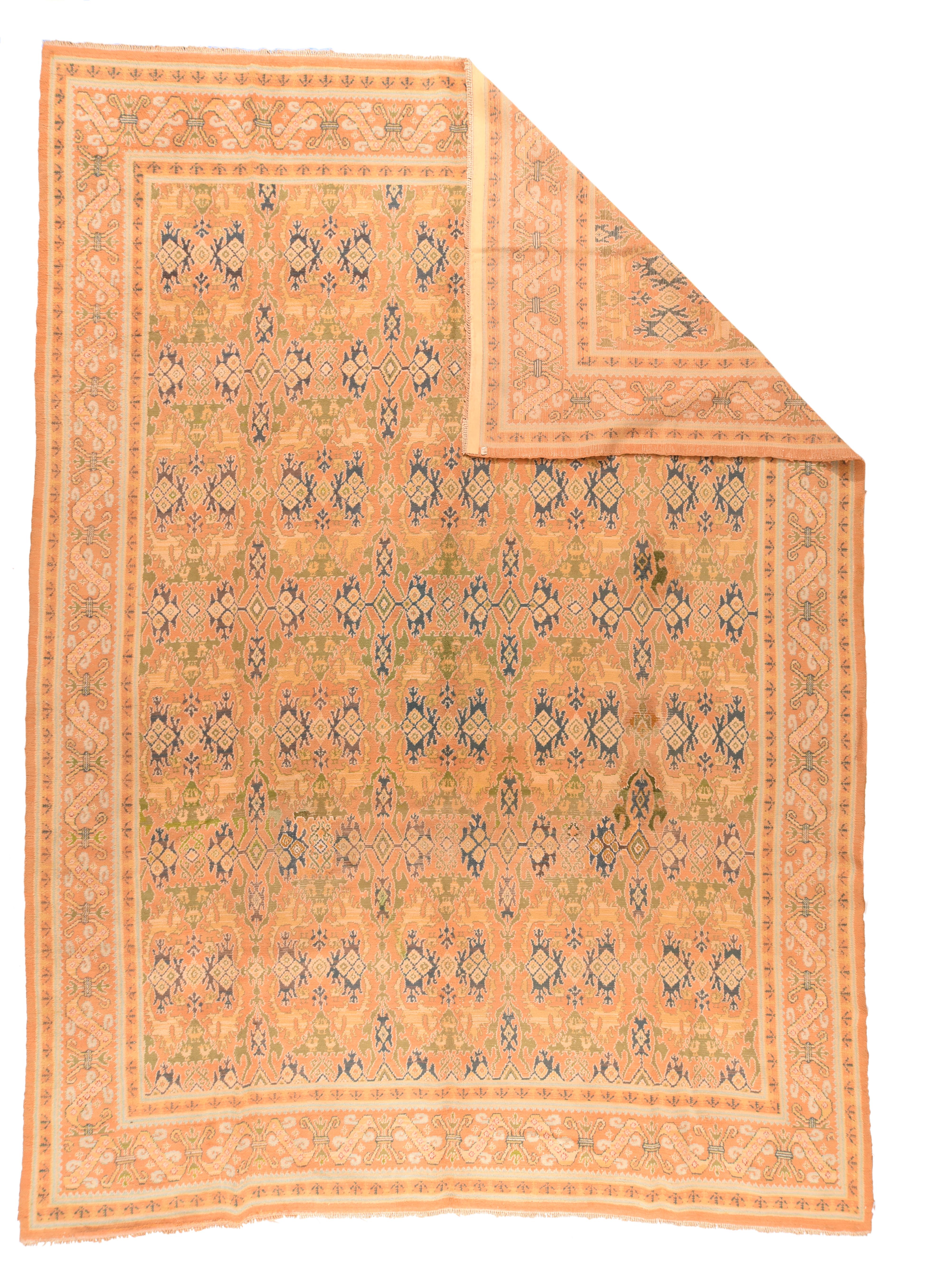 Antique Spanish Rrug 9'8'' x 13'4''. In the Renaissance style, and adapted from Lotto Oushaks, this European room size shows golden ochre field covered by an allover pattern of forked arabesque and blue palmette crosses and pairs. Rust-apricot
