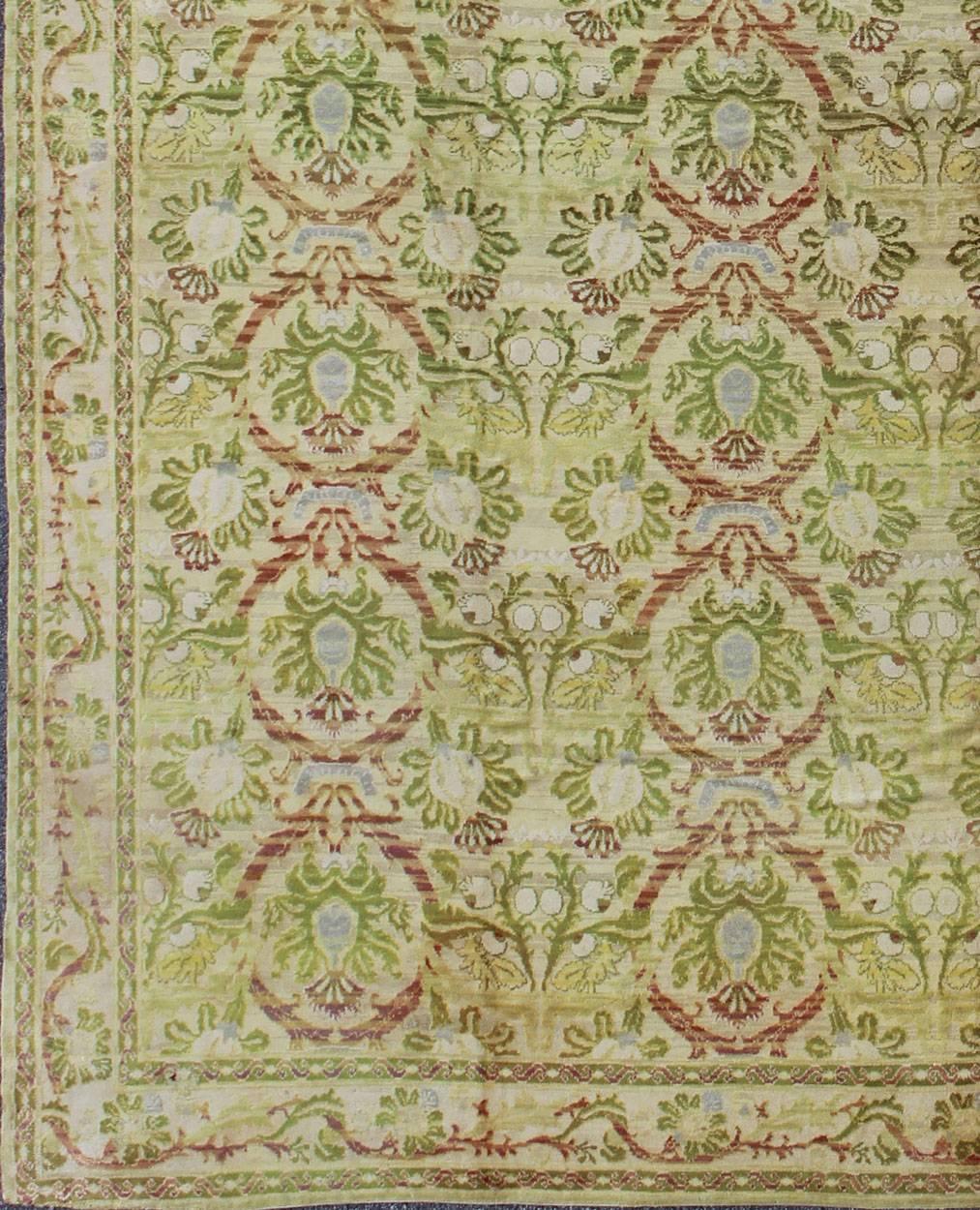 Antique Spanish rug with circular floral medallions in golden green and red, rug j10-0803, country of origin / type: Spain / Spanish Colonial, circa 1900

This elegant antique Spanish carpet is the proud heir to a long tradition of rug-weaving in