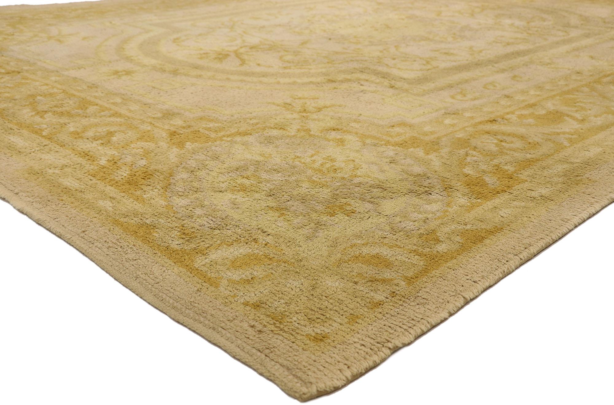 77421 antique Spanish Savonnerie rug with Louis XIV style. Regal and refined, this stunning hand-knotted wool Spanish Savonnerie rug beautifully highlights a regal Louis XIV aesthetic. It features an oval centre medallion patterned with stylized
