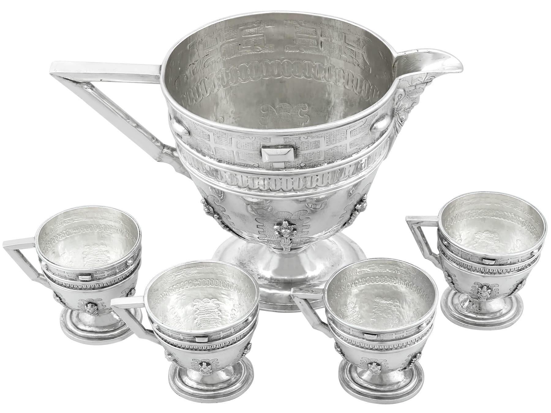 An exceptional, fine and impressive antique Spanish silver jug with matching cups; an addition to our range of drinks related silverware

This exceptional 18th century Spanish silver set consists of a jug and four matching cups.

Each piece of