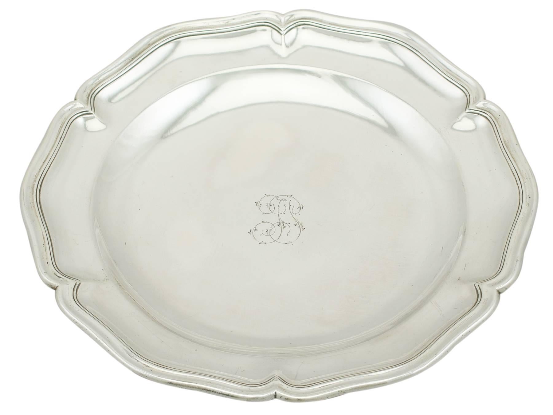 An exceptional, fine and impressive pair of antique Spanish silver plates; an addition to our silver tray, salver and platter collection.

These exceptional antique Spanish silver plates have a hexafoil shaped form.

The surface of each plate is