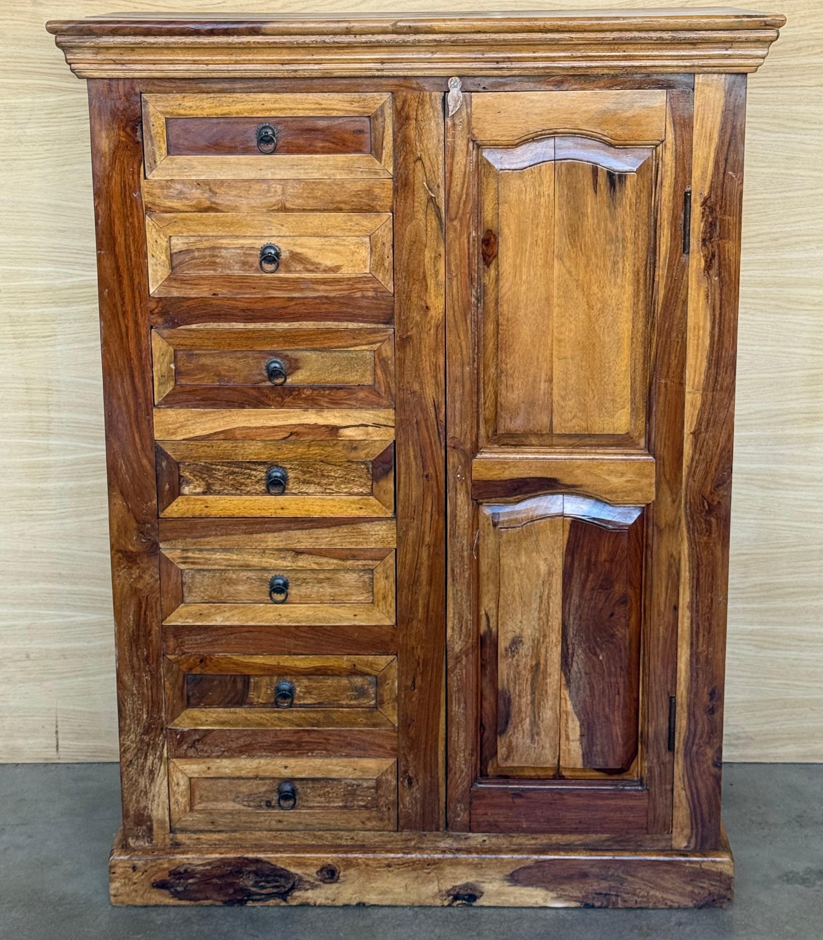 A beautiful, rustic antique olive larder or pie cabinet cupboard that dates from the late 1900s in Spain. These cabinets were used in kitchens throughout eastern Europe, for food storage. It is in good condition for its age and has recently been