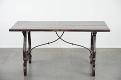 Antique Spanish table from the early 18th century with a cast iron base