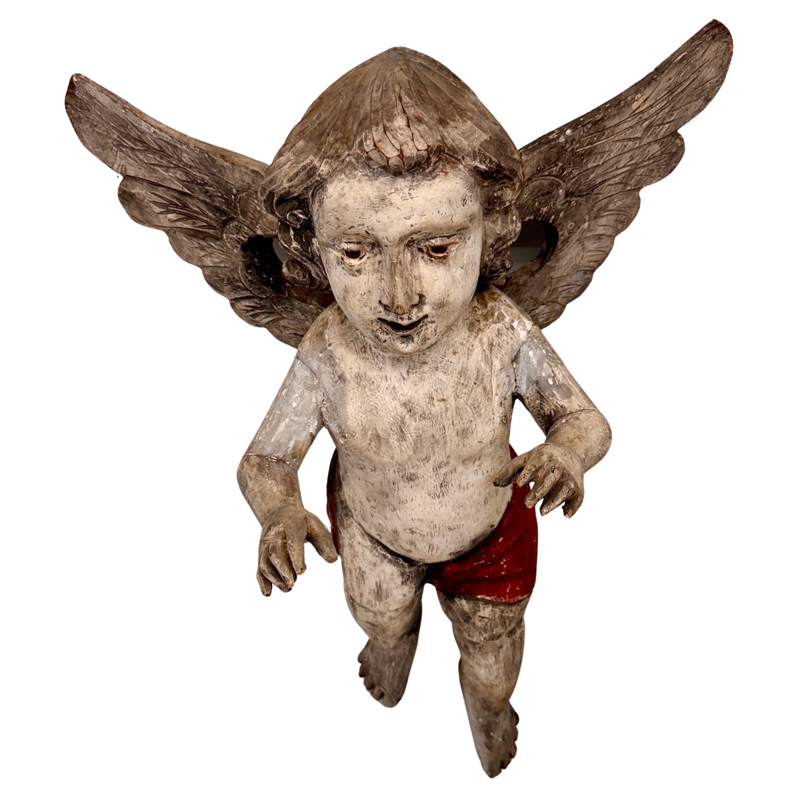 Espagnol Sculpture espagnole ancienne d'ange putti en bois avec ailes en vente
