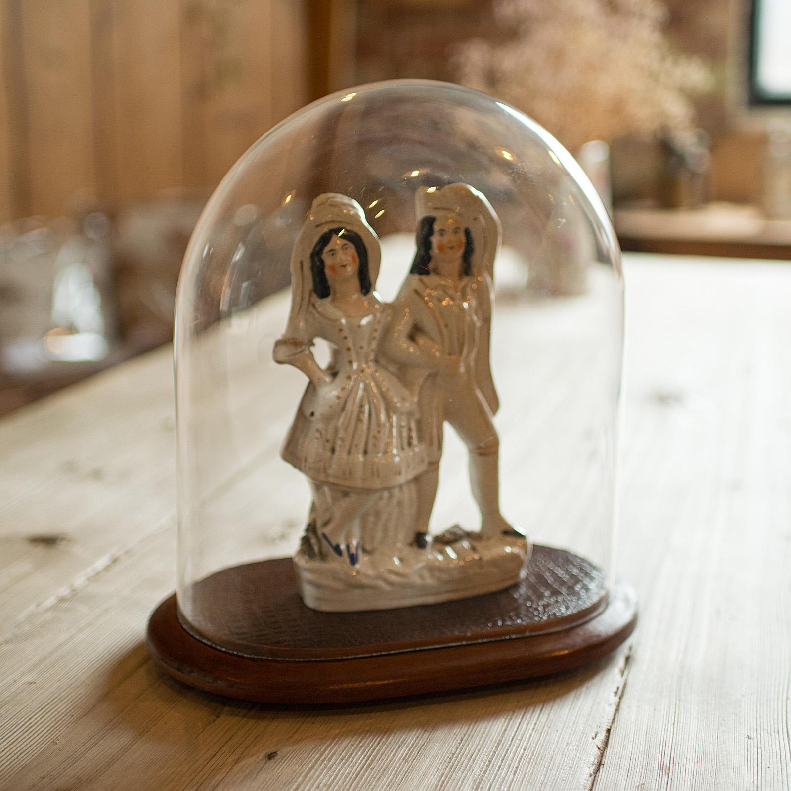 
This is an antique specimen display dome. An English, glass and beech collector's showcase, dating to the late Victorian period, circa 1890.

Wide, squat proportion with a delightful clear appearance
Displays a desirable aged patina and in good