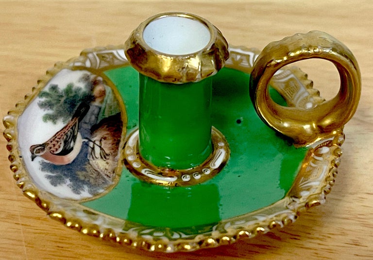 Antique Spode Ornithological Miniature Chamberstick 
With rich apple green background, with gilt ring handle, painted with a vignette of a Whinchat in landscape. Signed Spode in script, shape no. 2114.