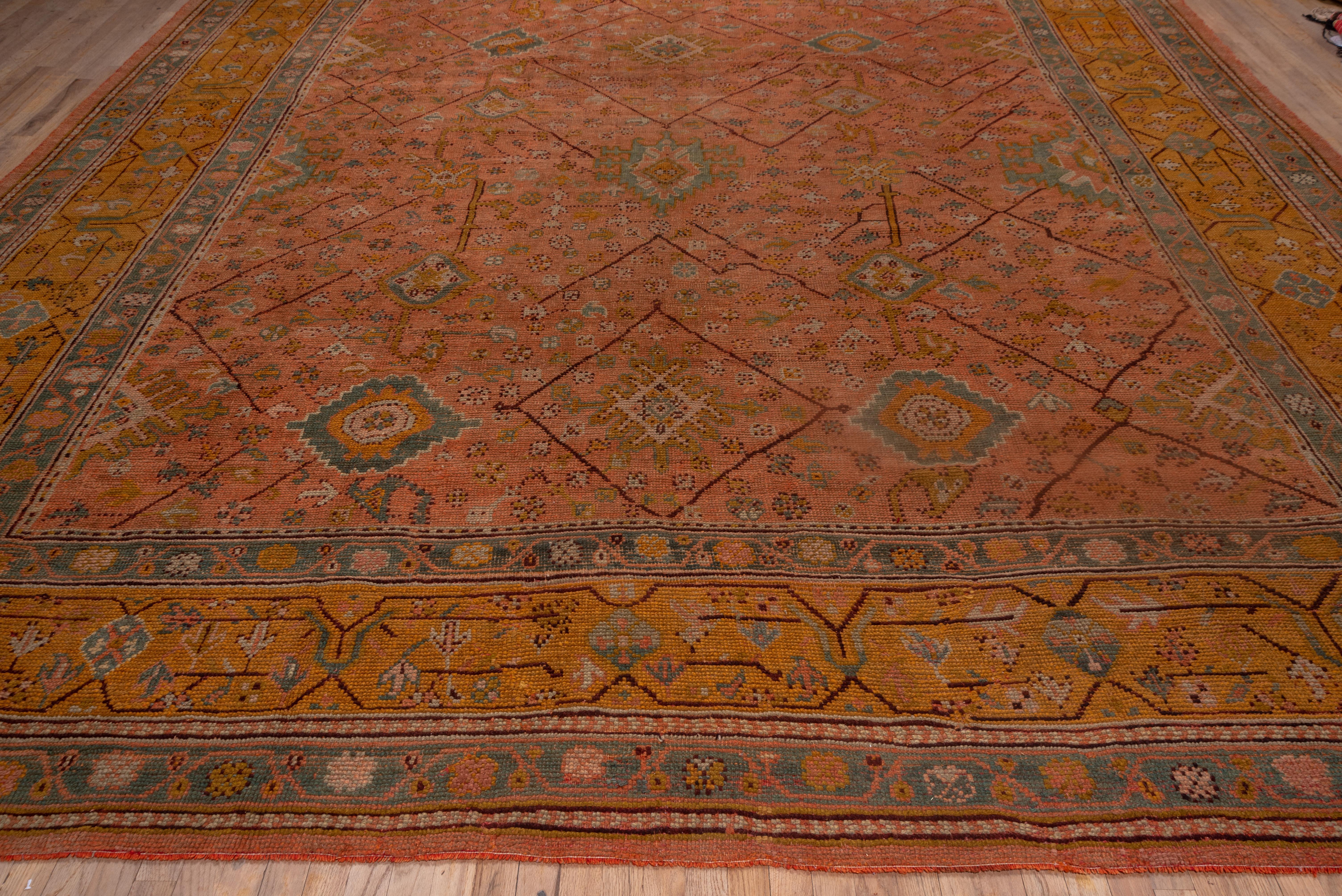 Wool Antique Square Turkish Oushak Carpet, Pink Allover Field, Mustard & Green Border For Sale