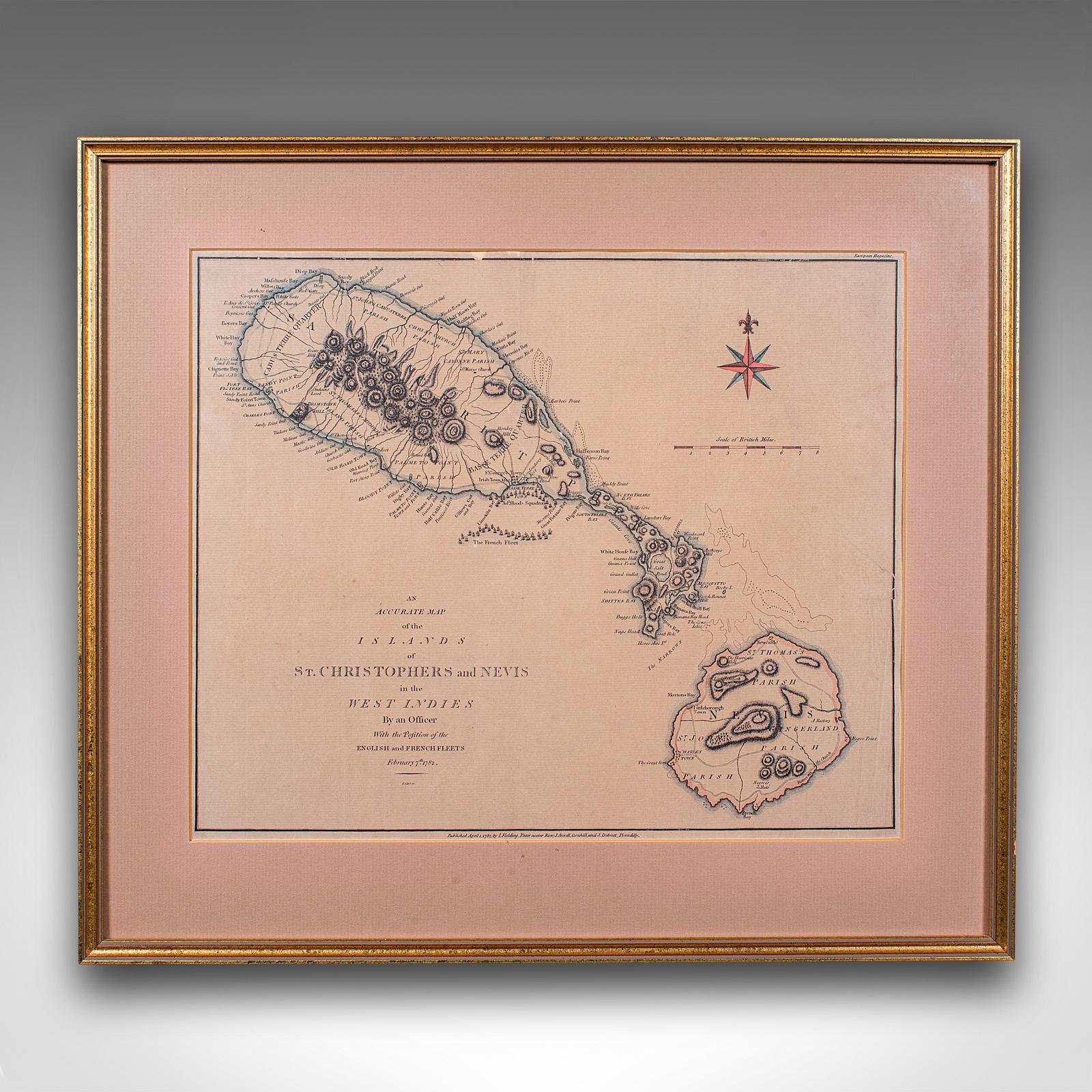 Voici une superbe carte ancienne de St Christophe et Nevis. Gravure anglaise encadrée représentant la cartographie d'une île des Caraïbes, datant de la période géorgienne et plus tard, vers 1780. Une description fascinante de ces îles jumelles,
