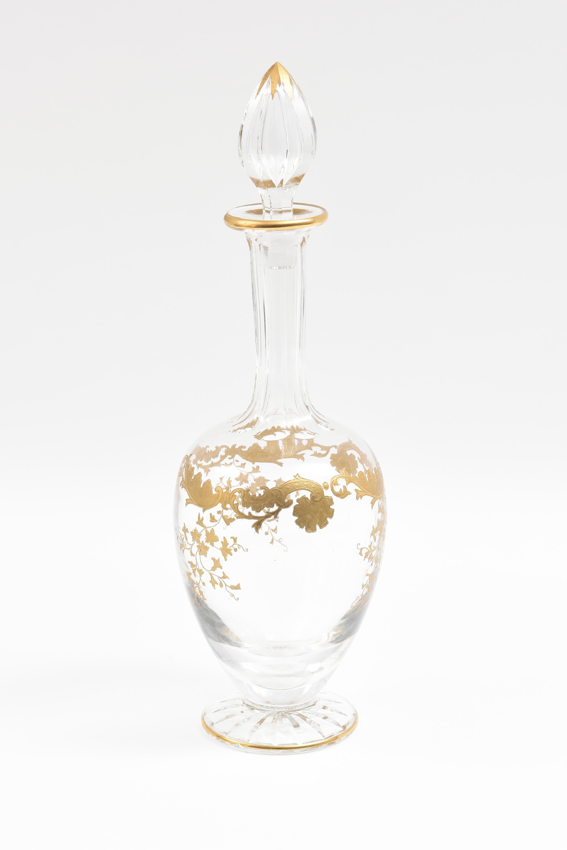 A Classic and elegant pattern from the Saint Louis crystal firm. This piece dates to just after the turn of the last century, circa 1910. Fine cut pedestal shape and rich gilding surround to the body of the decanter. In very nice antique condition.
