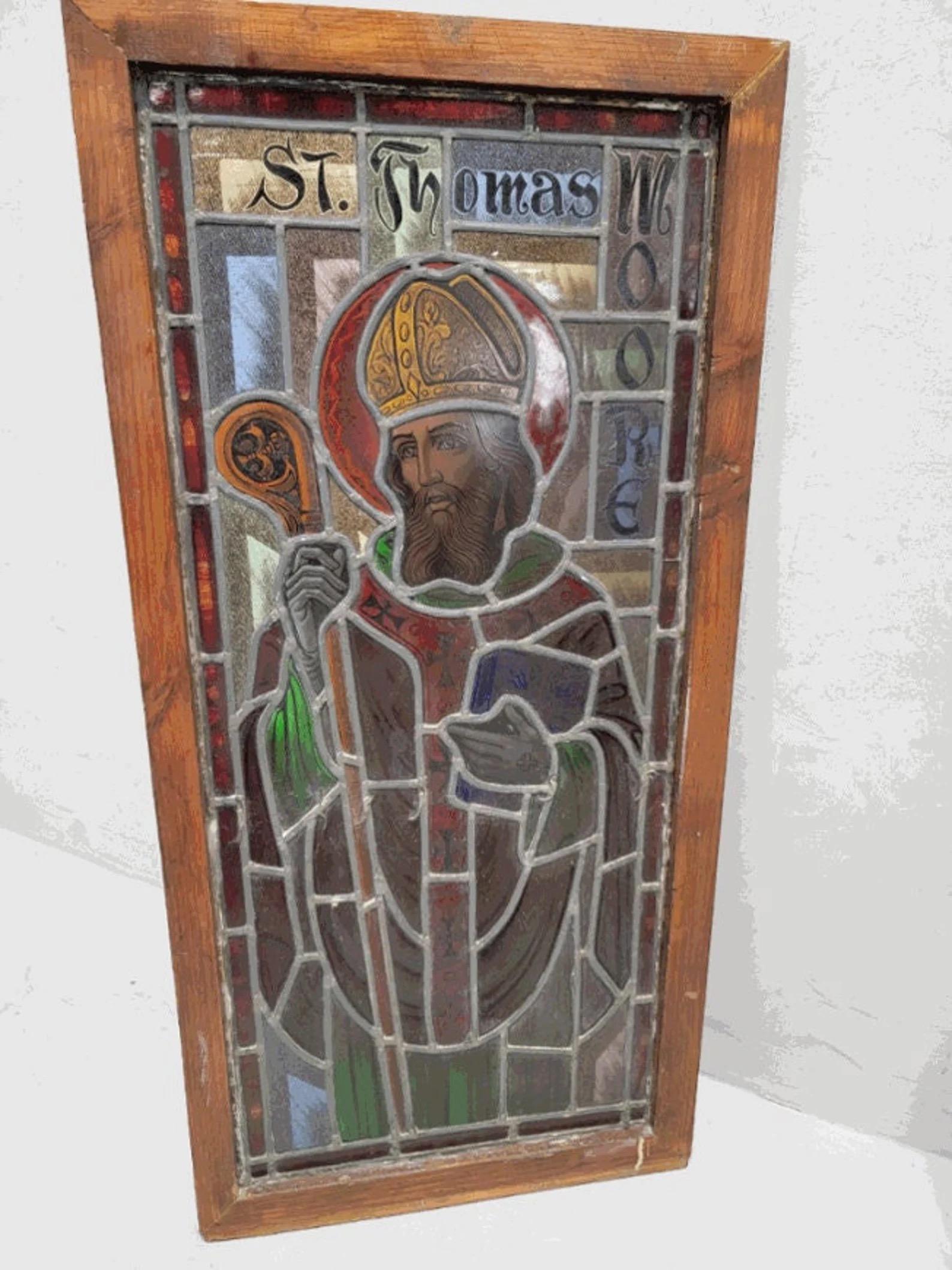 Antique St. Thomas Moore Church Salvage Wood Framed Stained Glass Window

This stained glass panel was salvaged from an old church in Chicago. The stained glass depicts English bishop, Saint Thomas Moore. Install this panel in your living room,