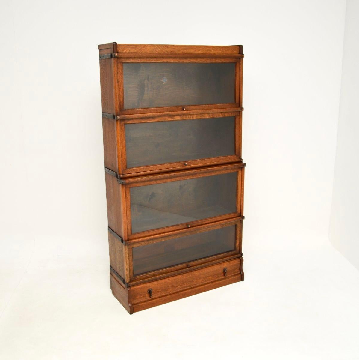 A wonderful antique stacking Globe Wernicke bookcase in oak. This was made in England, it dates from the 1920’s.

The quality is superb, this is a great looking and very practical item. It is a great size with plenty of storage space, the glass
