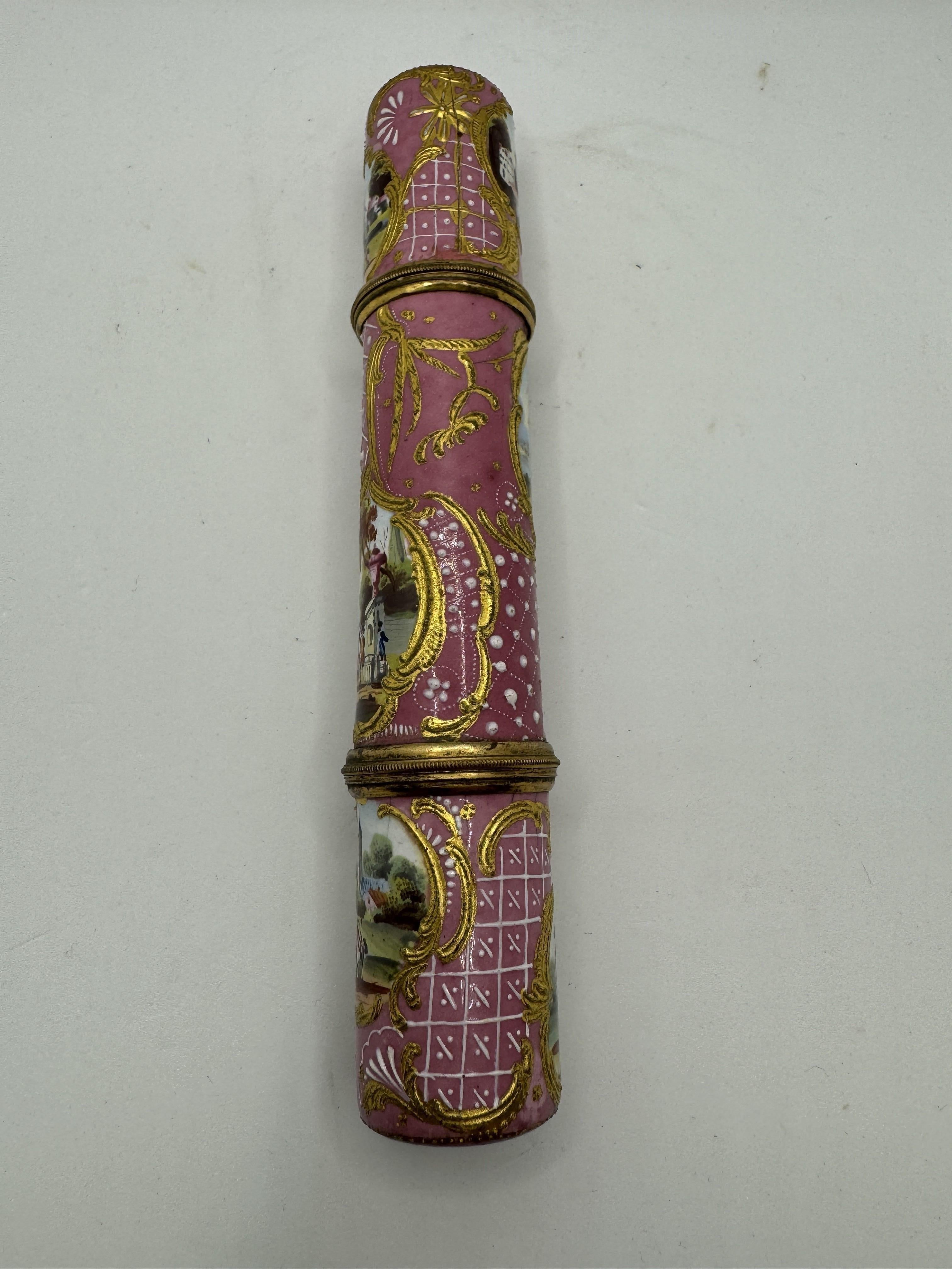Antique Staffordshire 18th Century Etui / Bodkin Case, pink ground with screw-on compartment at the opposing end, with panels of figures in landscapes within raised gold borders. Circa 1765  

