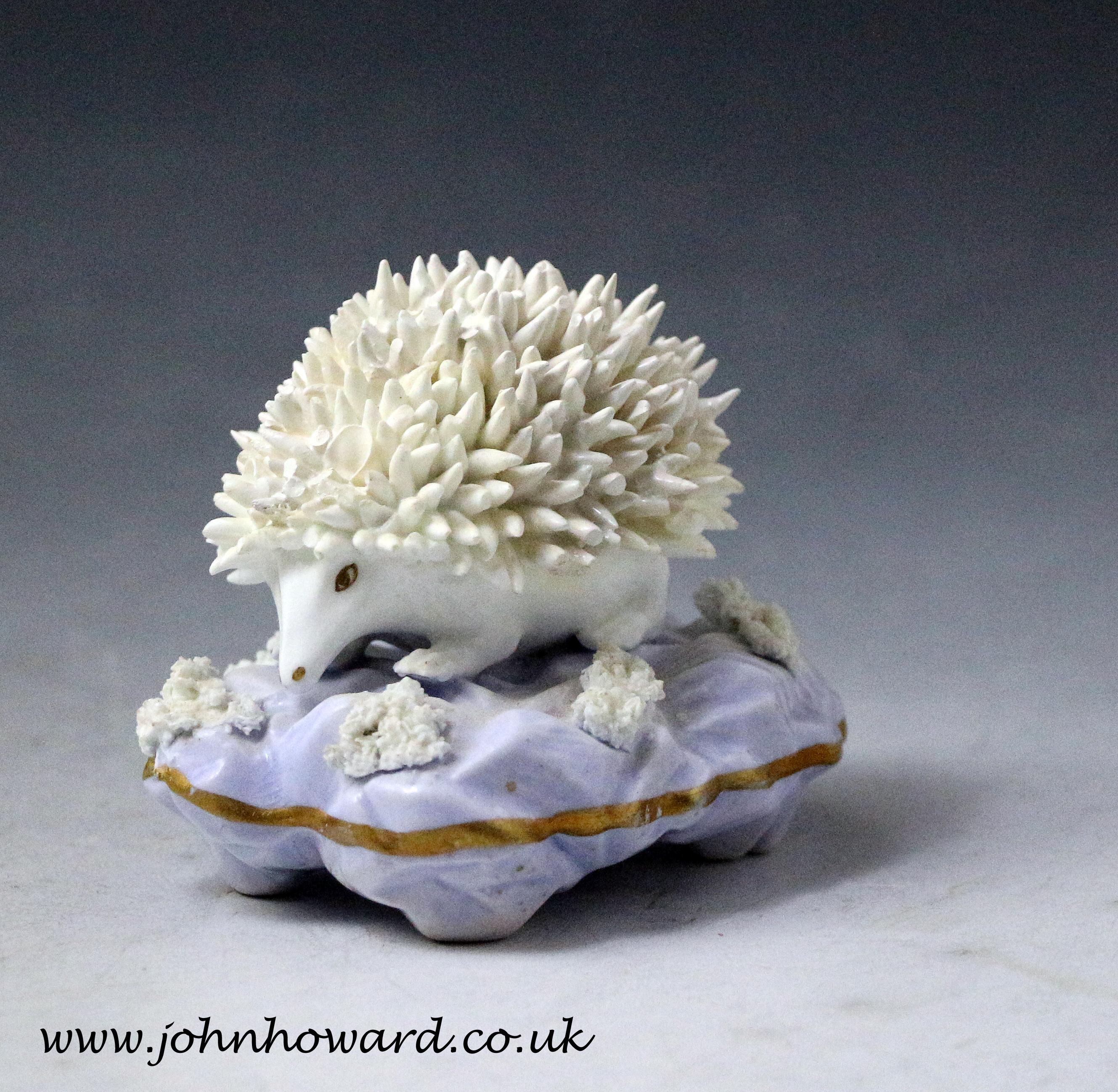 Dated: 1835 Staffordshire, England

Antique Staffordshire porcelain figure of a hedgehog, early 19th century England, made by Samuel Alcock. The hedgehog is modeled on a mauve rocky shaped base and is a very rare figure. D.G. Rice in his reference