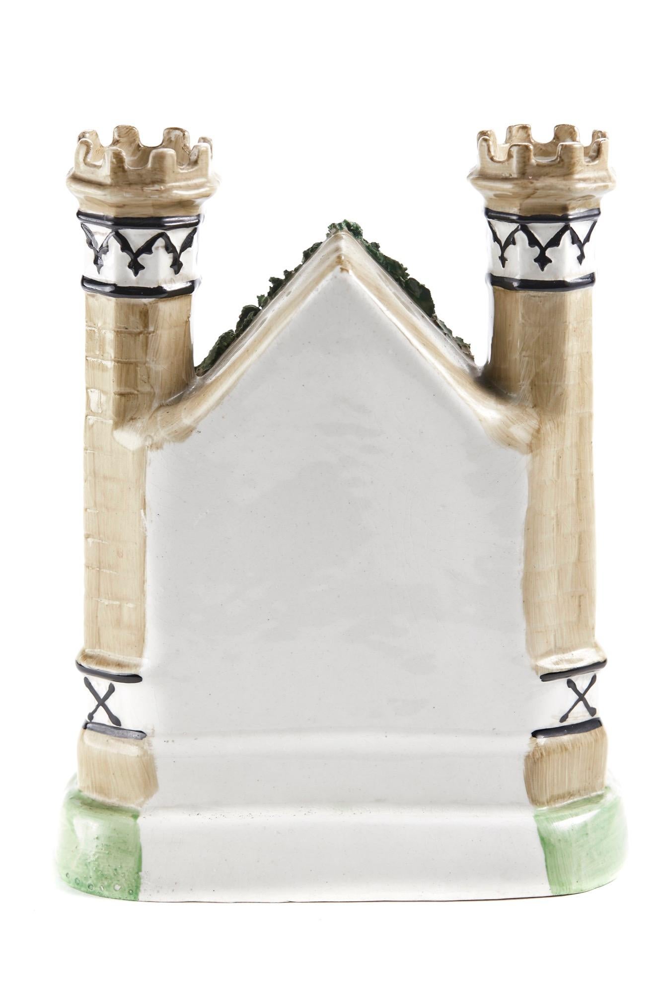 This antique Staffordshire flatback castle, wonderful colors and in perfect condition.