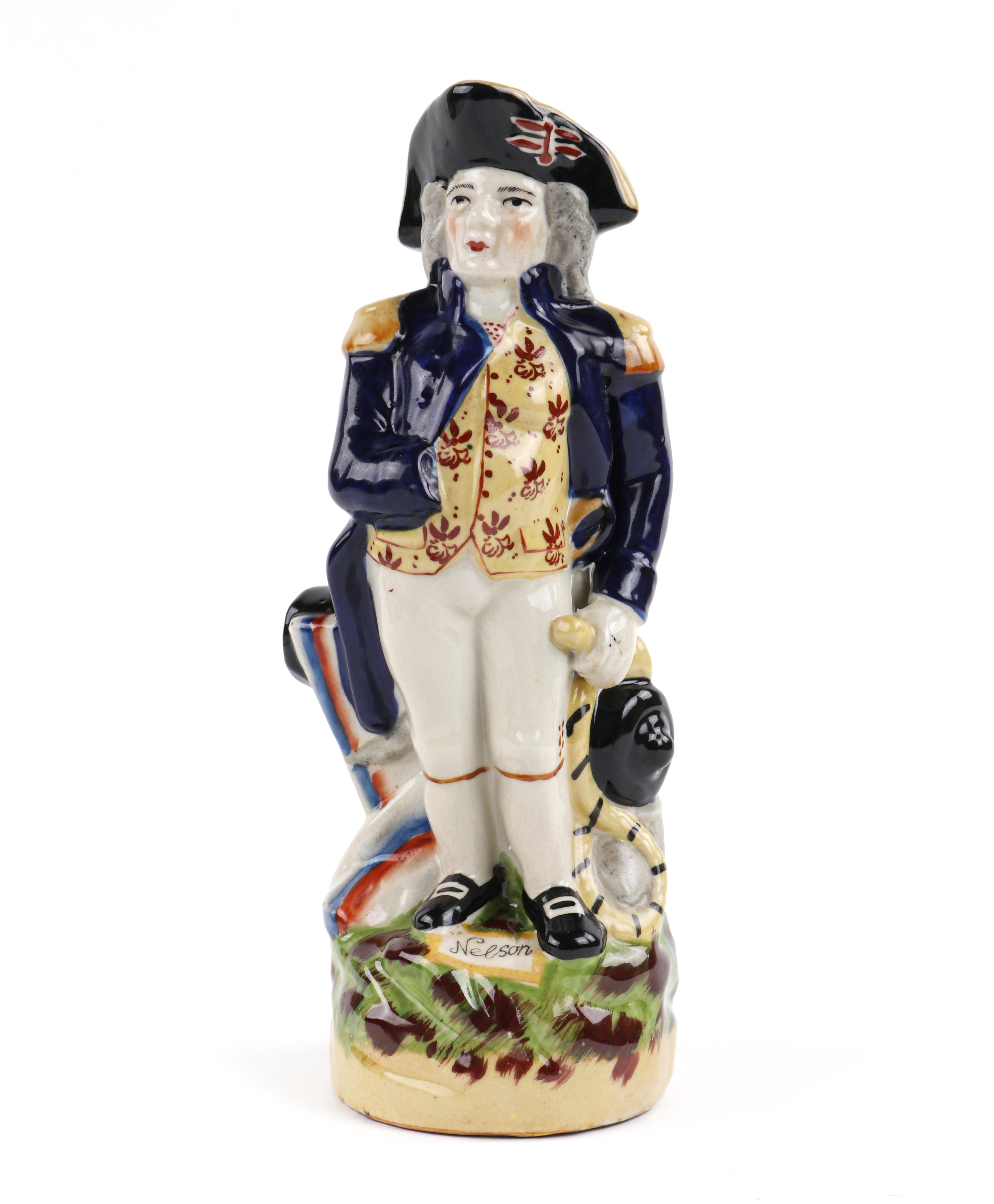 Antique Staffordshire Lord Horatio Nelson Hand Painted Toby Jug Pitcher Figure

This antique sculpted figural toby jug is modelled as Vice Admiral Horatio Nelson (British, 1758-1805). He stands in front of a cannon, with his right hand tucked in