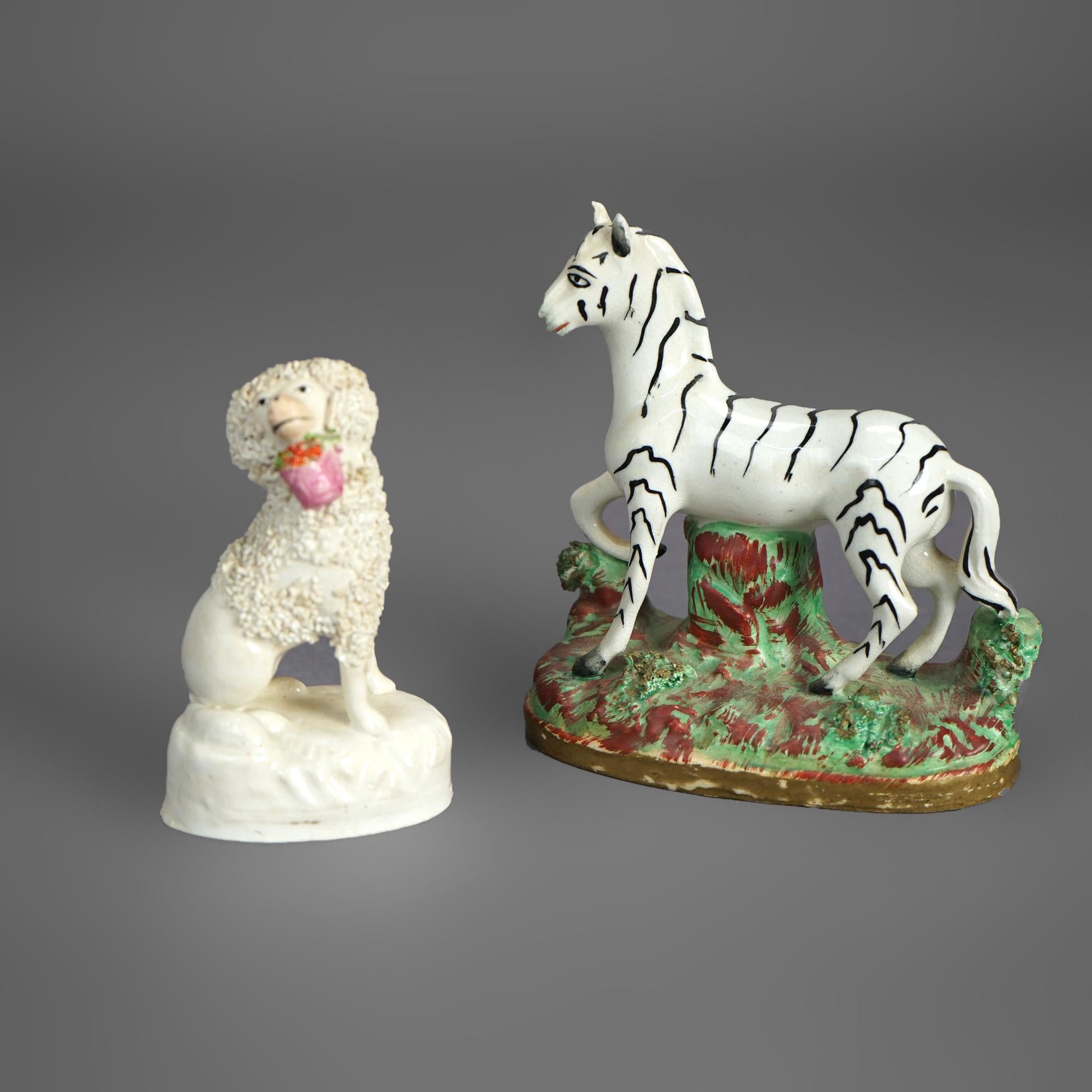 Antike Staffordshire Polychromed Porzellan Zebra & Pudel Hund Figuren C1870

Maße - Zebra: 5''H x 4,75''L x 2,5''D; Hund: 4''H x 2,5''L x 2''D