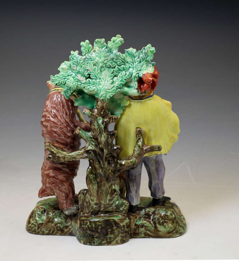 English Staffordshire Pottery Figure of a Dancing Bear Group with Bocage, circa 1820 For Sale