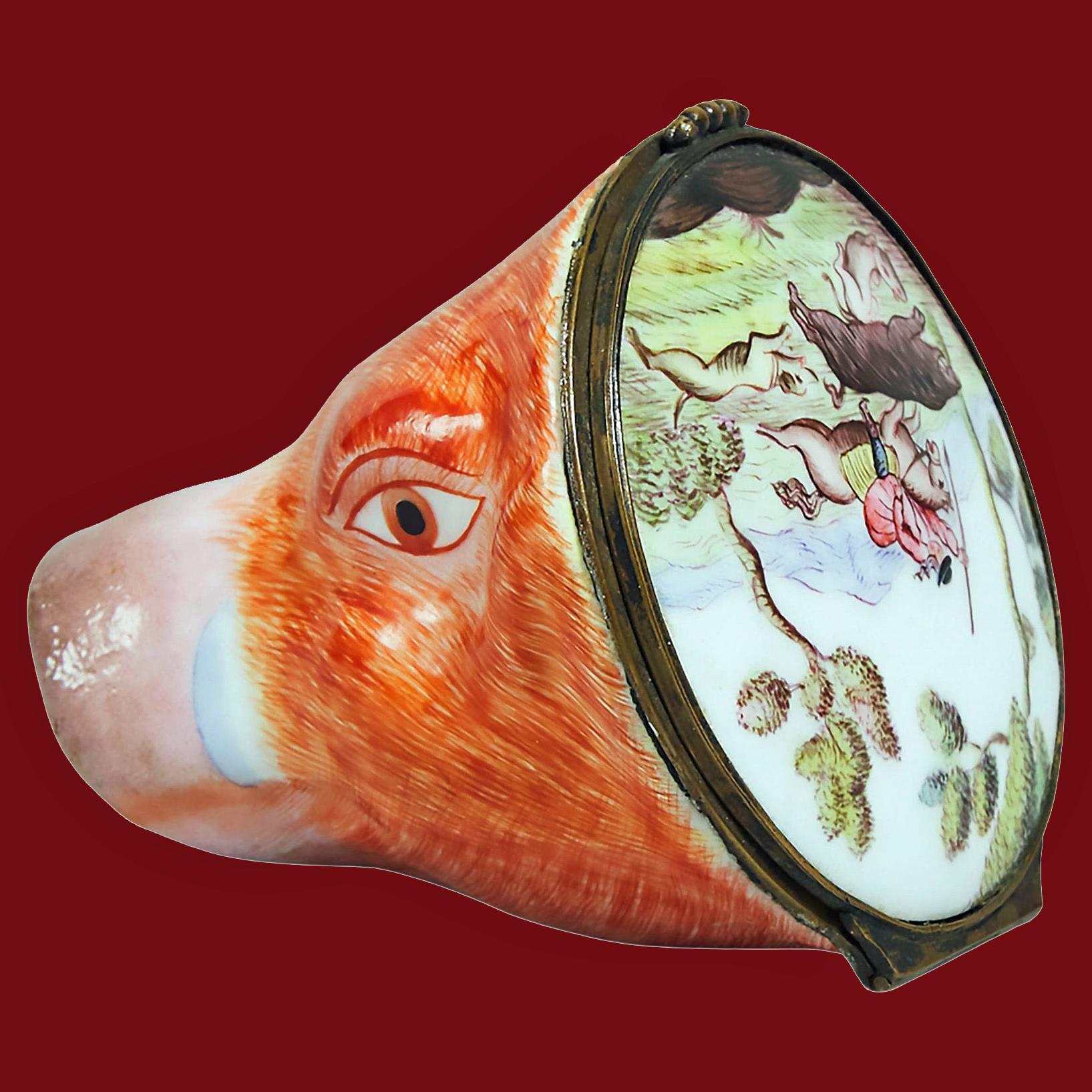 Antique Staffordshire Stirrup cup, rare, covered porcelain Boar's Head form, c. 1870 The cup is exceptionally well coloured and molded with wonderful and rare hinged cover painted enameled scene of a boar hunt. Height: 2.8 inches. Condition: Good no