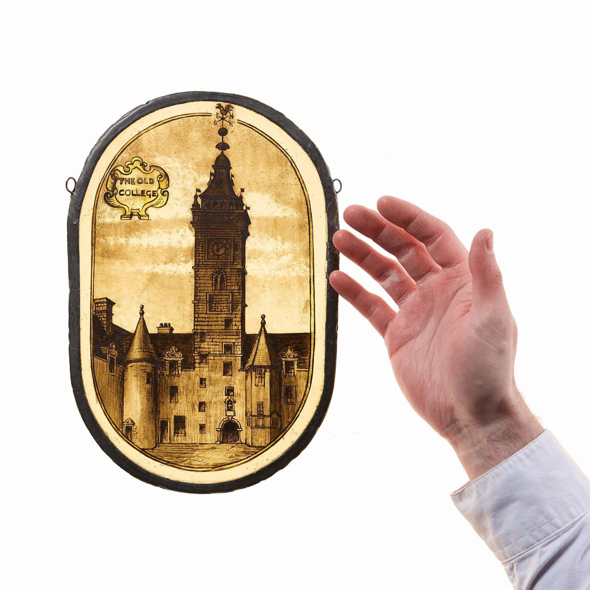 An interesting and intricately handpainted late 19th century stained glass panel depicting Glasgow’s 17th century Old University College in High Street. The University of Glasgow later moved to Gilmorehill in 1870.

We are also selling another panel