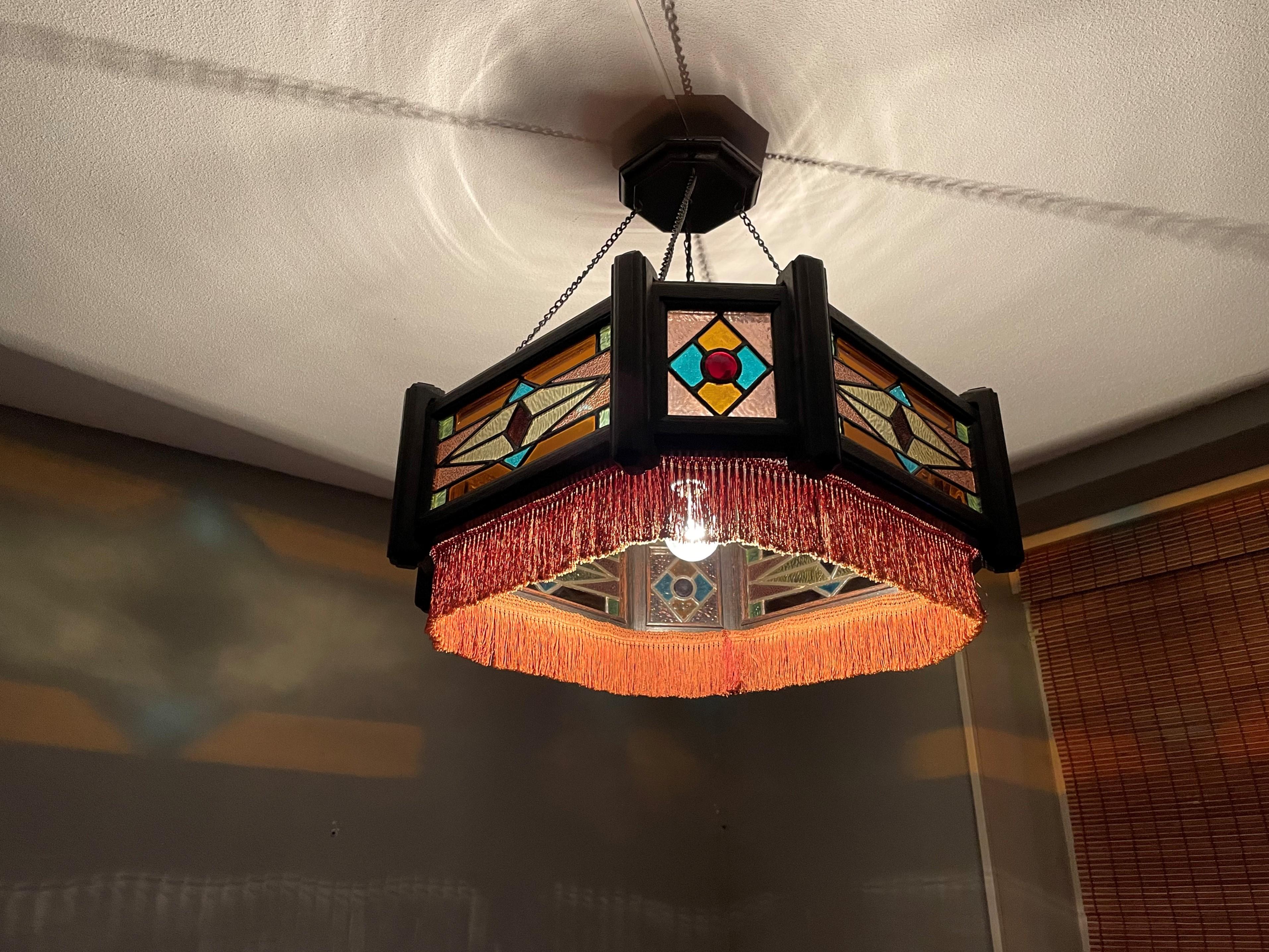 Antique Stained Glass & Stained Oak Art Deco Pendant Chandelier w. Great Colors In Excellent Condition For Sale In Lisse, NL