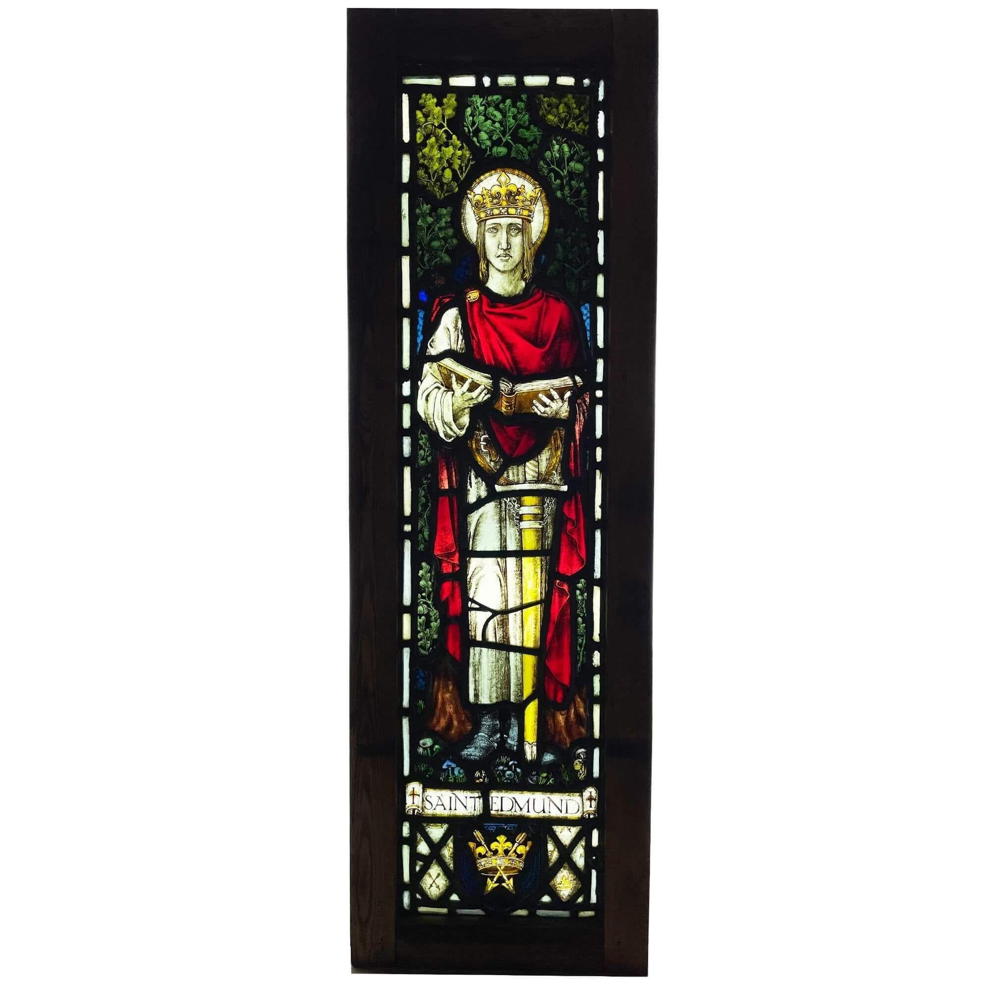 An antique ecclesiastical stained glass window of Saint Edmund reclaimed from Beeleigh Abbey. This dramatic stained glass window reads 'Saint Edmund’ on a religious scroll. Competently painted, this window is a stunning and detailed interior feature