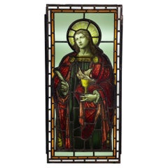 Antikes Buntglasfenster des heiligen Johannes und des Drachens