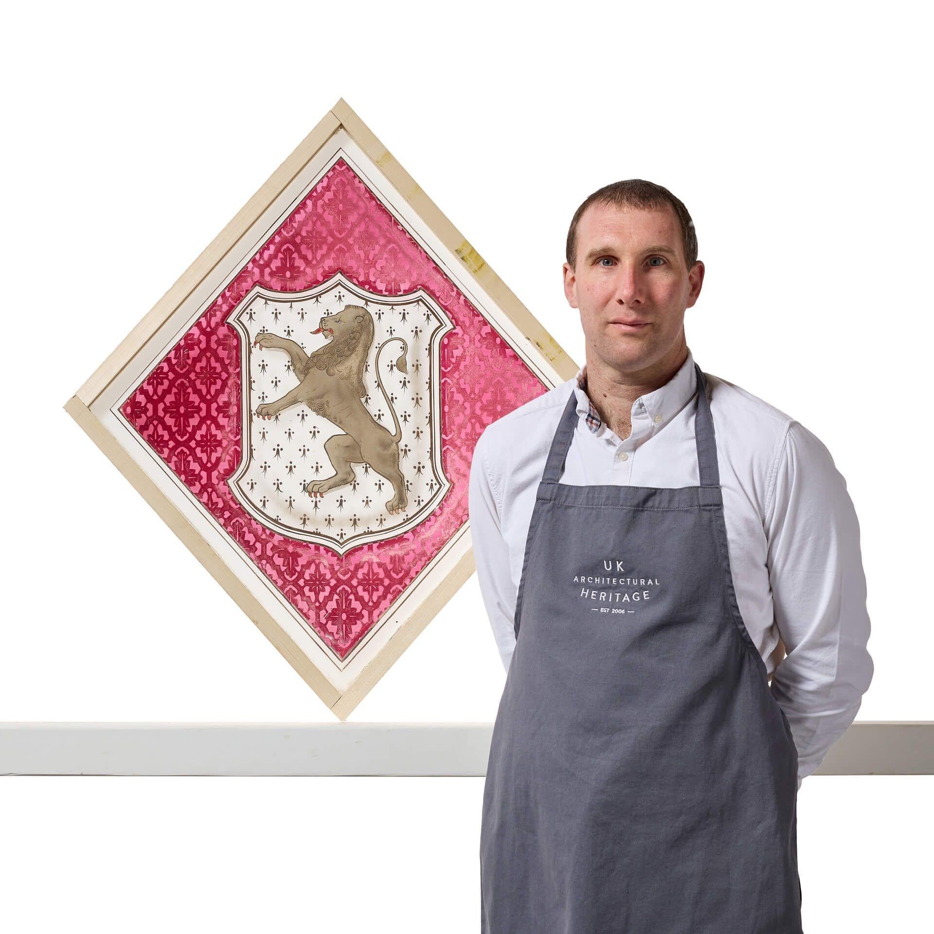 A large antique stained glass window detailed with the armorial crest of the Welsh family of Tudor Trefor; one of a series of 3 we are selling in the same style.

This diamond-shaped window is an impressive piece, steeped in heritage, featuring a