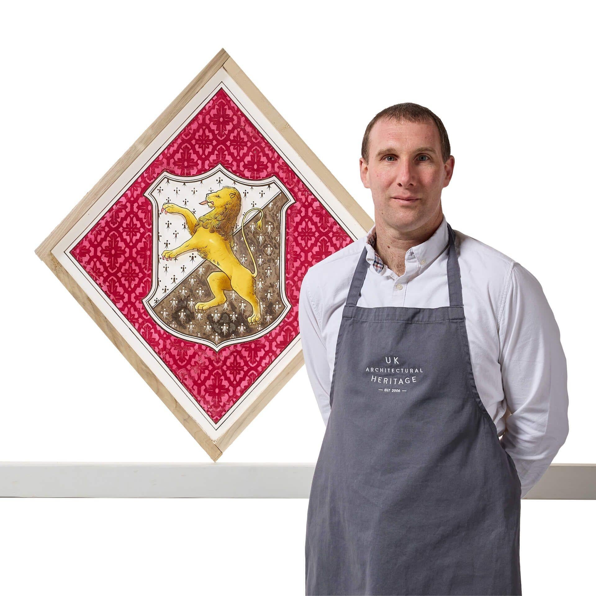 A large antique stained glass window detailed with the armorial crest of the Welsh family of Tudor Trefor; one of a series of 3 we are selling in the same style.

This diamond-shaped window is an impressive piece, steeped in heritage, featuring a