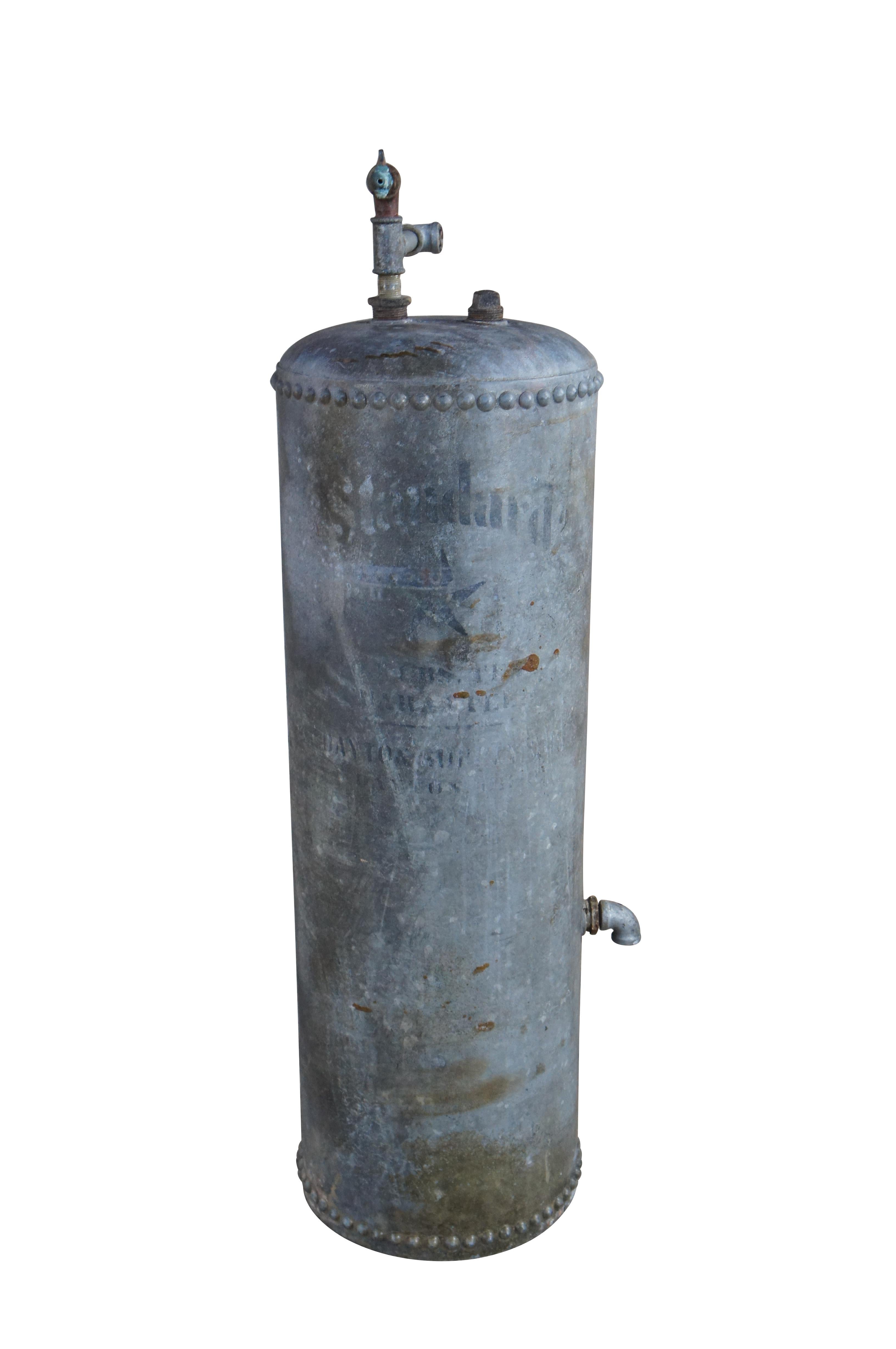 An early 20th Century Art Deco Era Copper Water Heater Tank. The tank was used at Maggie's Place on North Dixie, one of the oldest continuously operating bars in Dayton, Ohio.   It is marked Standard with a star logo as well as inscribed Dayton,